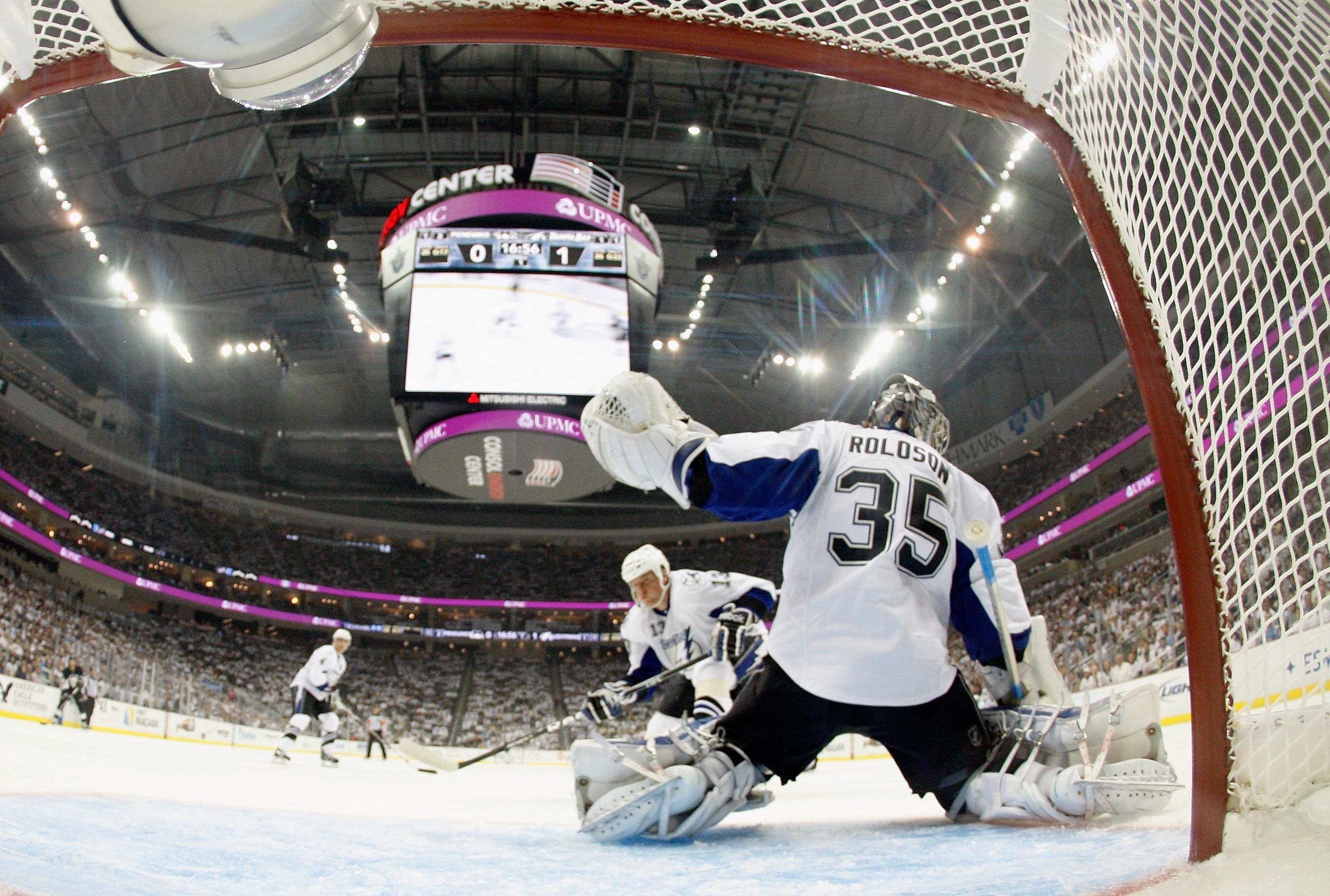 PITTSBURGH, PA - APRIL 15:  Goalie Dwayne Roloson#35 of the Tampa Bay Lightning blocks the net during Game Two of the Eastern Conference Quarterfinals against the  Pittsburgh Penguins during the 2011 NHL Stanley Cup Playoffs at Consol Energy Center on Apr