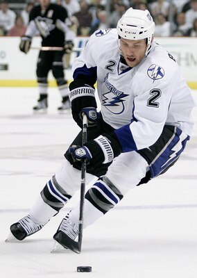 PITTSBURGH, PA - APRIL 15:  Eric Brewer#2 of the Tampa Bay Lightning controls the puck during Game Two of the Eastern Conference Quarterfinals against the  Pittsburgh Penguins during the 2011 NHL Stanley Cup Playoffs at Consol Energy Center on April 15, 2