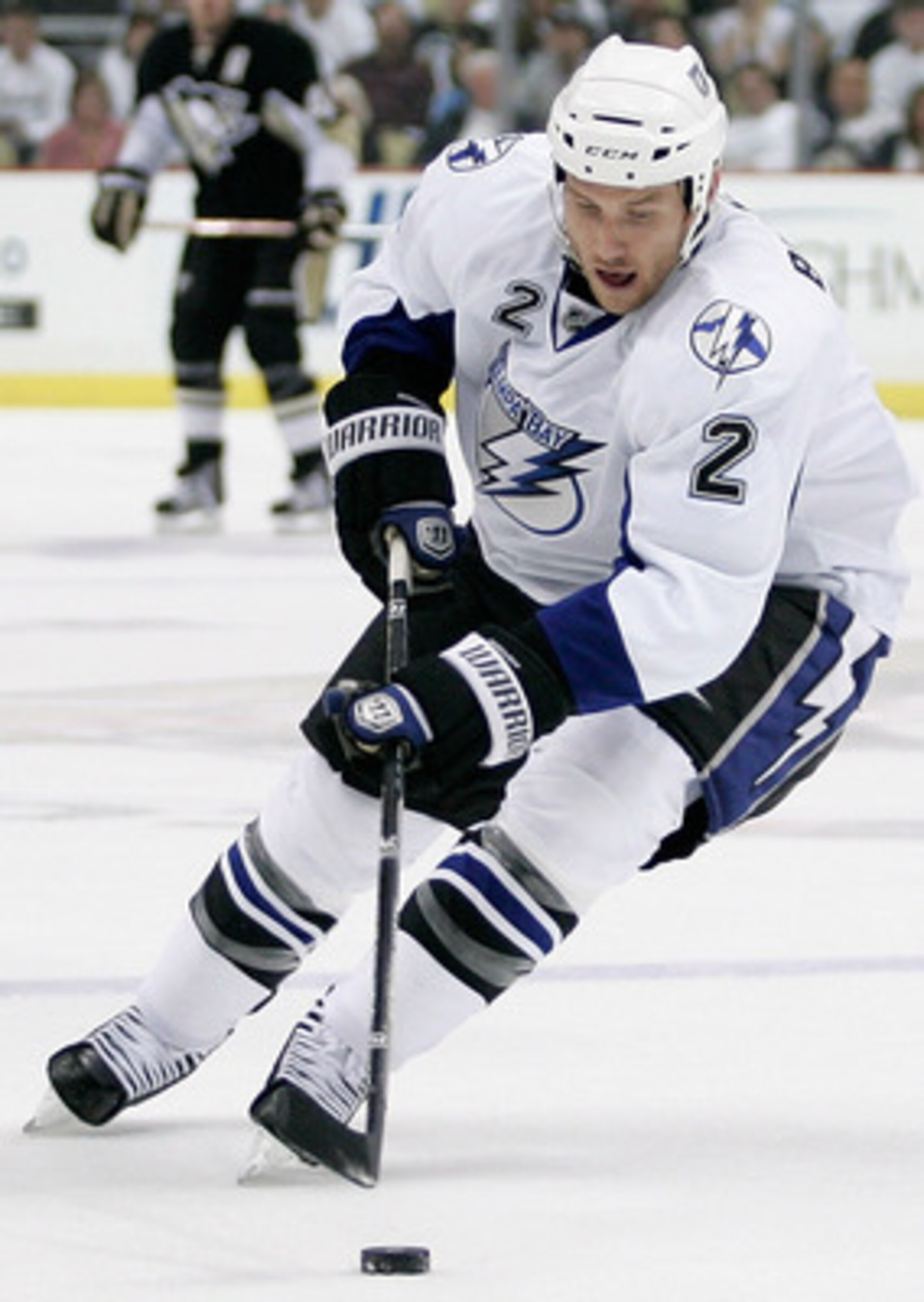 PITTSBURGH, PA - APRIL 15:  Eric Brewer#2 of the Tampa Bay Lightning controls the puck during Game Two of the Eastern Conference Quarterfinals against the  Pittsburgh Penguins during the 2011 NHL Stanley Cup Playoffs at Consol Energy Center on April 15, 2