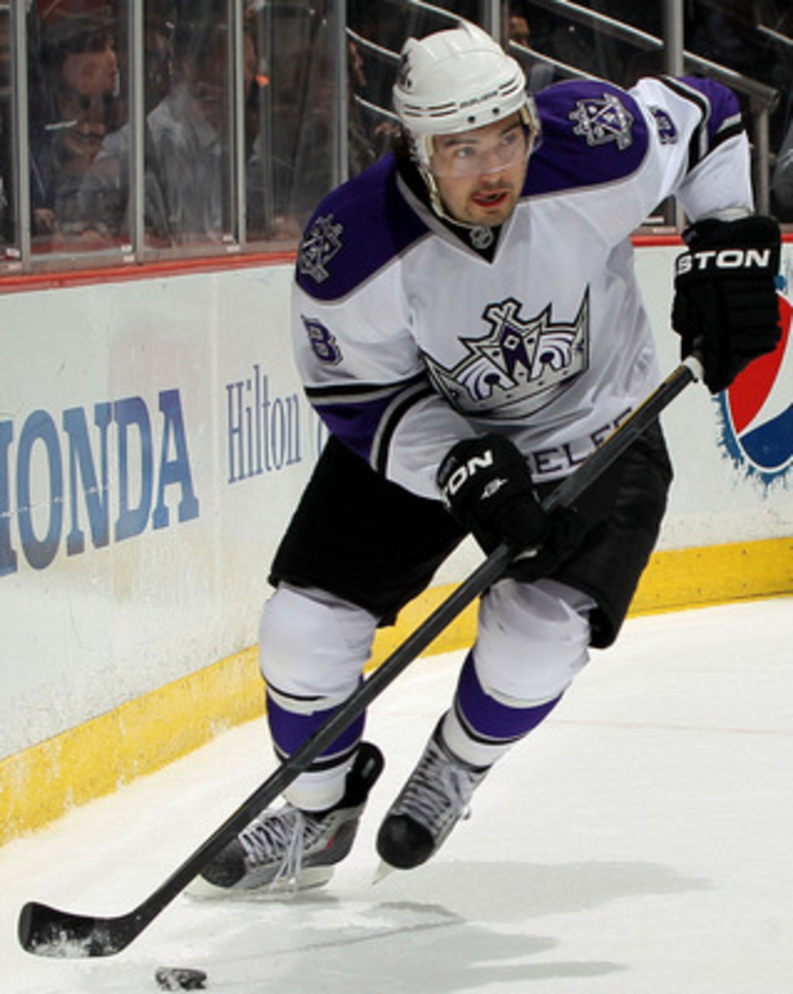 ANAHEIM, CA - APRIL 8:  Drew Doughty #8 of the Los Angeles Kings skates with the puck against the Anaheim Ducks at Honda Center on April 8, 2011 in Anaheim, California.   (Photo by Stephen Dunn/Getty Images)