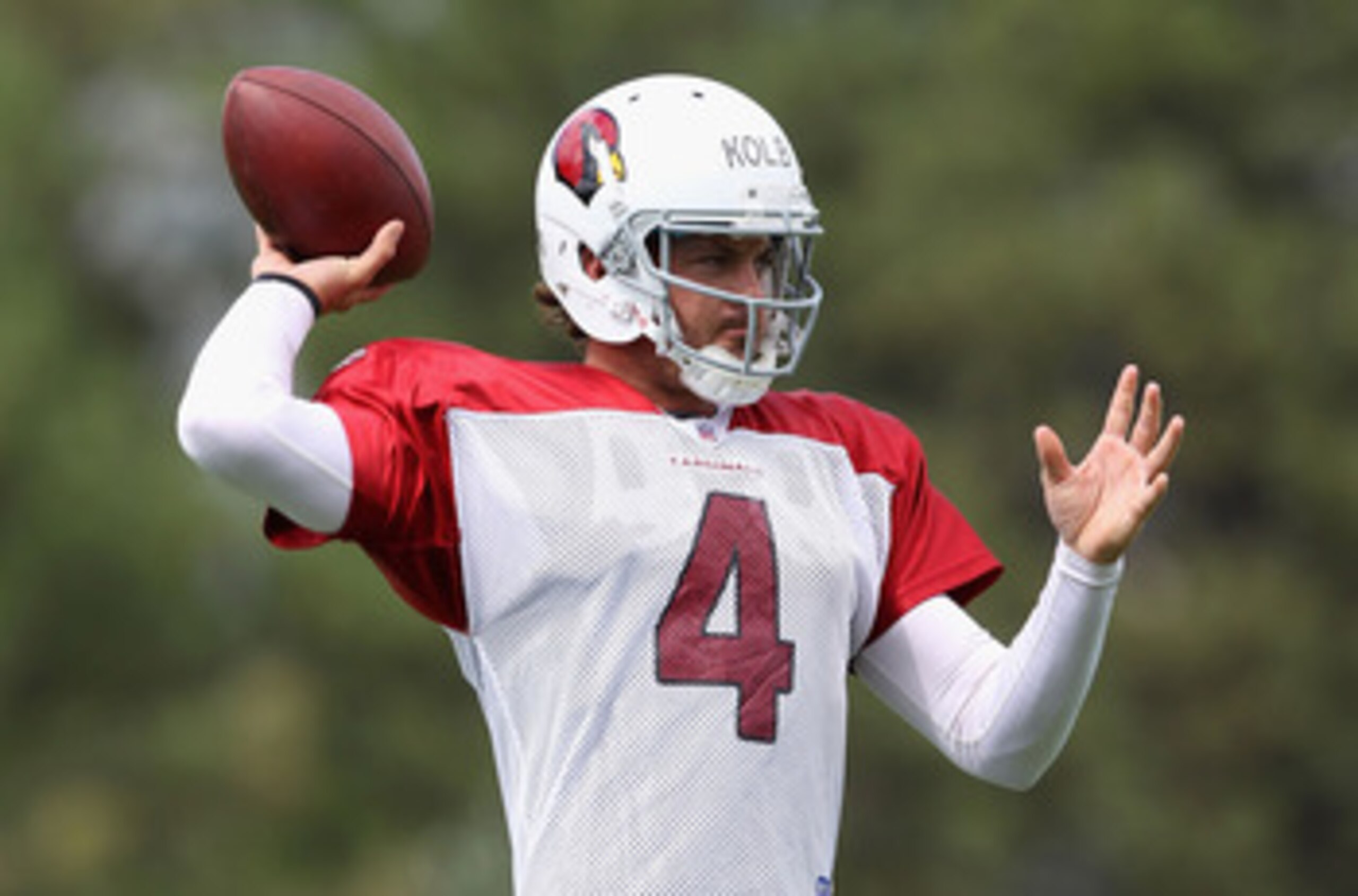 FLAGSTAFF, AZ - AUGUST 04:  Quarterback Kevin Kolb #4 of the Arizona Cardinals throws a pass during the team training camp at Northern Arizona University on August 4, 2011 in Flagstaff, Arizona.  (Photo by Christian Petersen/Getty Images)