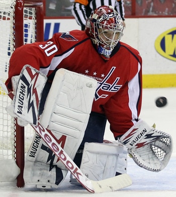 WASHINGTON, DC - APRIL 15:  Michal Neuvirth #30 of the Washington Capitals makes the save against the New York Rangers in Game Two of the Eastern Conference Quarterfinals during the 2011 NHL Stanley Cup Playoffs at Verizon Center on April 15, 2011 in Wash