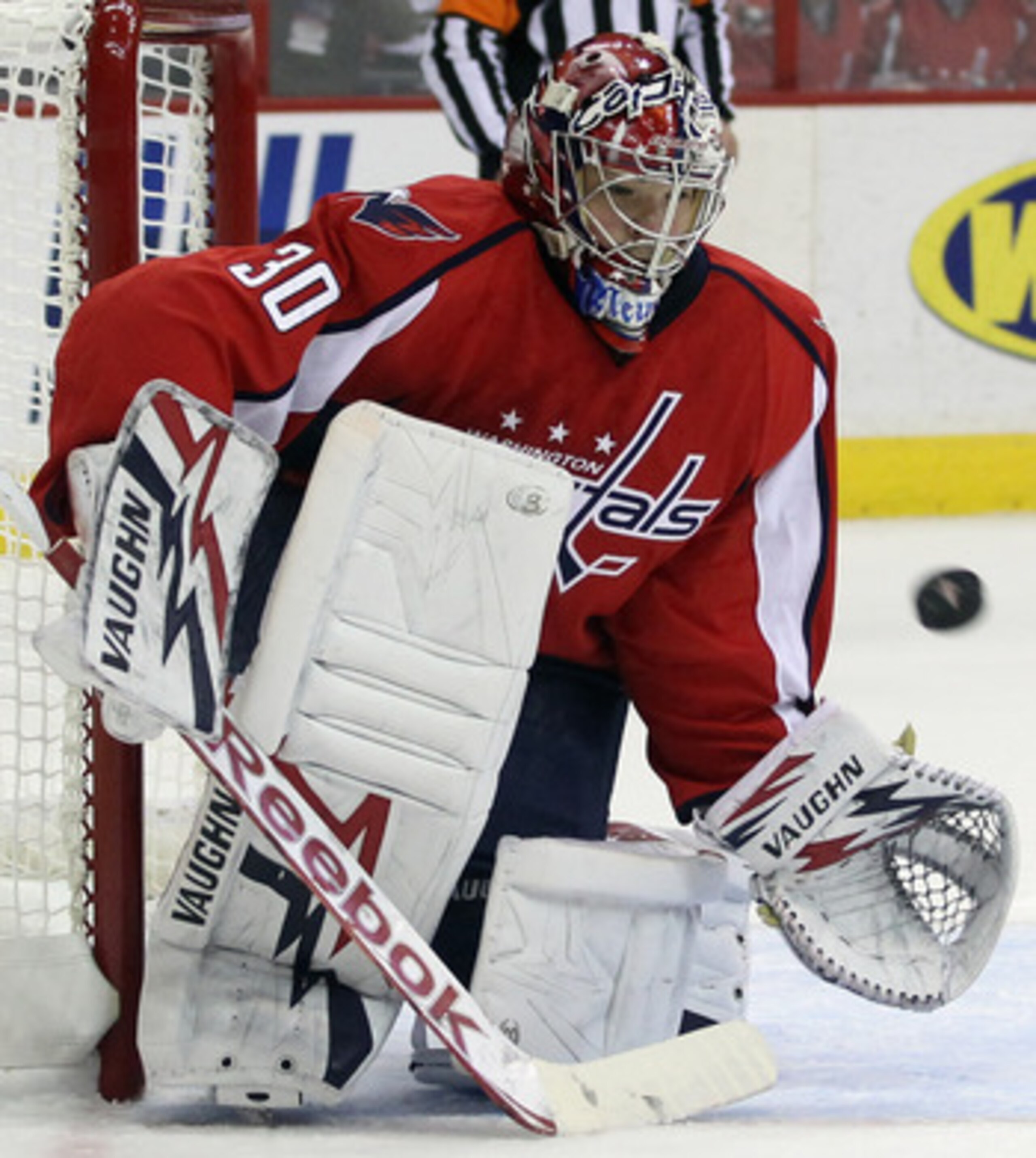 WASHINGTON, DC - APRIL 15:  Michal Neuvirth #30 of the Washington Capitals makes the save against the New York Rangers in Game Two of the Eastern Conference Quarterfinals during the 2011 NHL Stanley Cup Playoffs at Verizon Center on April 15, 2011 in Wash