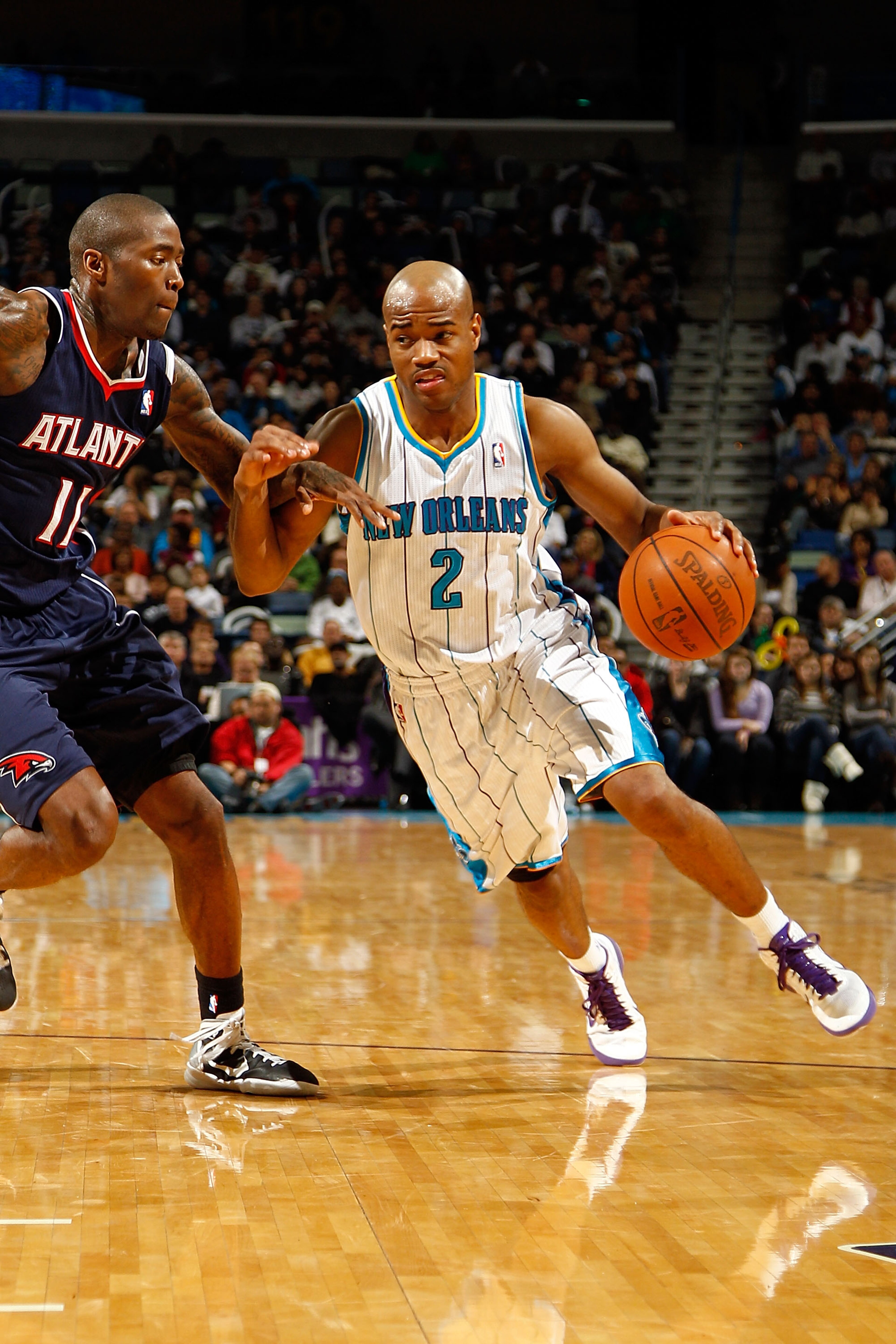 NEW ORLEANS, LA - DECEMBER 26: Jarrett Jack #2 of the New Orleans Hornets drives the ball around Jamal Crawford #11 of the Atlanta Hawks at the New Orleans Arena on December 26, 2010 in New Orleans, Louisiana. The Hornets defeated the Hawks 93-86. NOT NEW ORLEANS, LA - DECEMBER 26: Jarrett Jack #2 of the New Orleans Hornets drives the ball around Jamal Crawford #11 of the Atlanta Hawks at the New Orleans Arena on December 26, 2010 in New Orleans, Louisiana. The Hornets defeated the Hawks 93-86. NOT