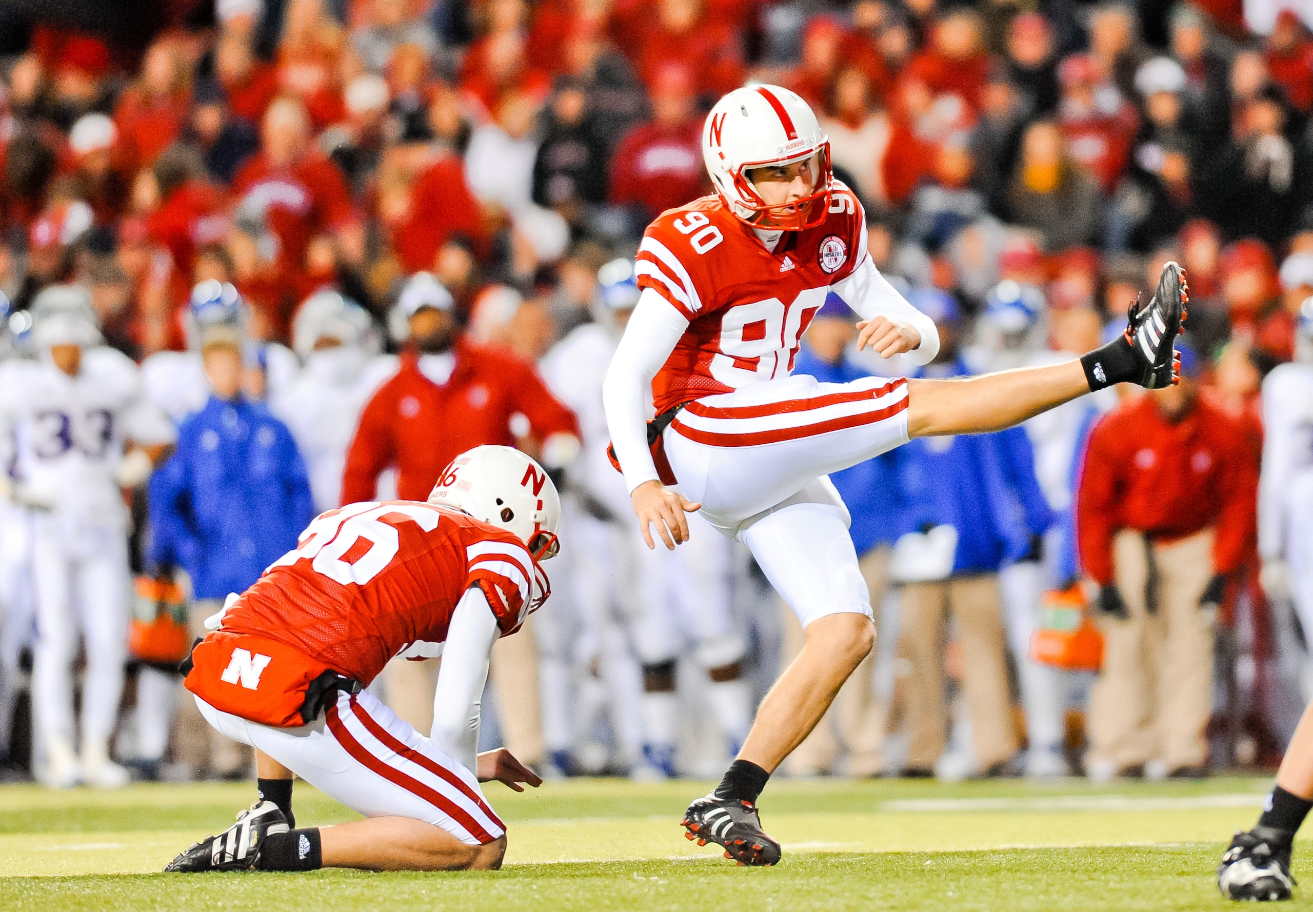 LINCOLN, NE - NOVEMBER 13: Alex Henery #90 of the Nebraska Cornhuskers kicks an extra point against the Kansas Jayhawks during their game at Memorial Stadium on November 13, 2010 in Lincoln, Nebraska. Nebraska Defeated Kansas 20-3. (Photo by Eric Francis/ LINCOLN, NE - NOVEMBER 13: Alex Henery #90 of the Nebraska Cornhuskers kicks an extra point against the Kansas Jayhawks during their game at Memorial Stadium on November 13, 2010 in Lincoln, Nebraska. Nebraska Defeated Kansas 20-3. (Photo by Eric Francis/