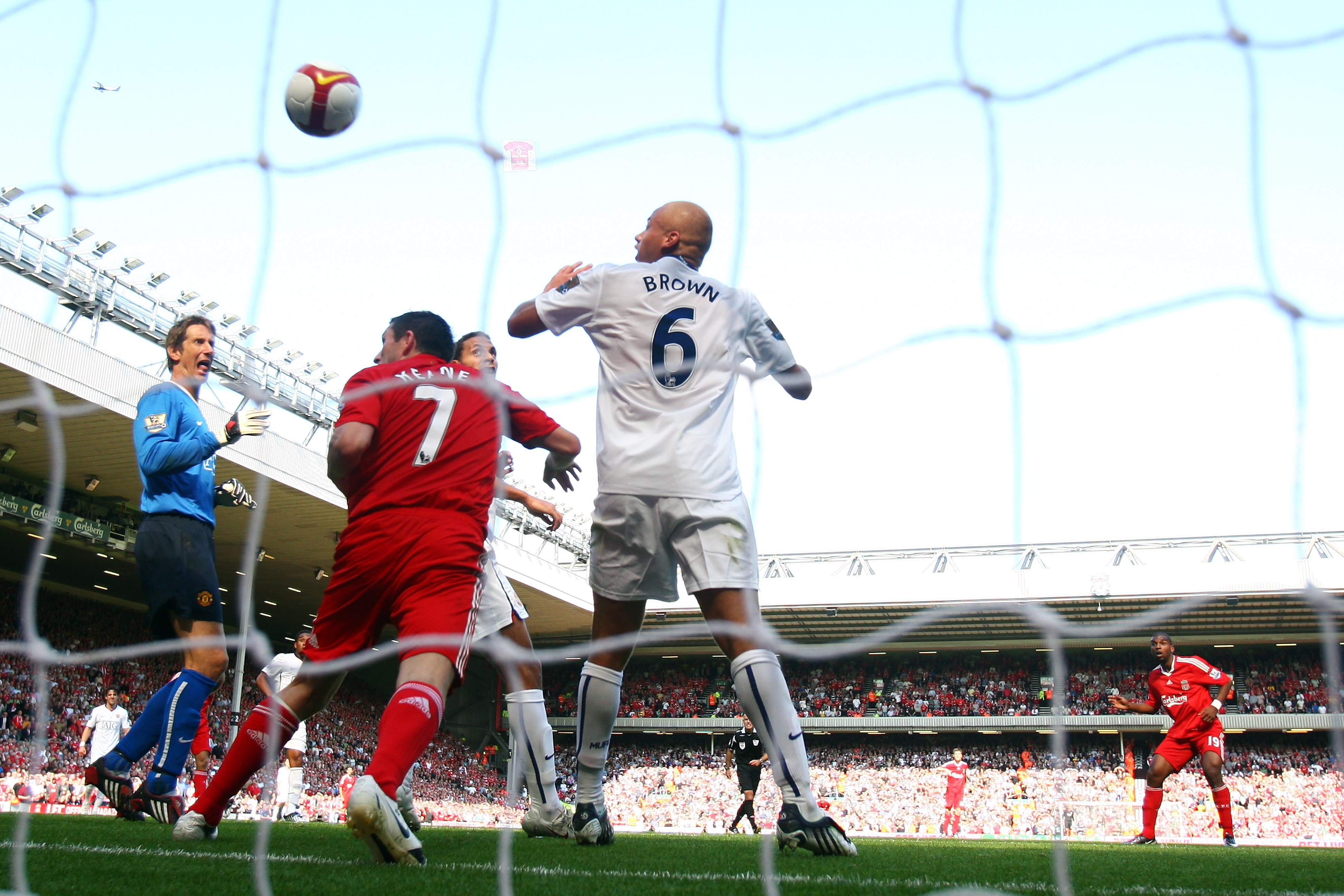 LIVERPOOL, UNITED KINGDOM - SEPTEMBER 13:  Ryan Babel (R) of Liverpool shoots and scores his teams second goal during Barclays Premier League match between Liverpool and Manchester United at Anfield on September 13, 2008 in Liverpool, England.  (Photo by