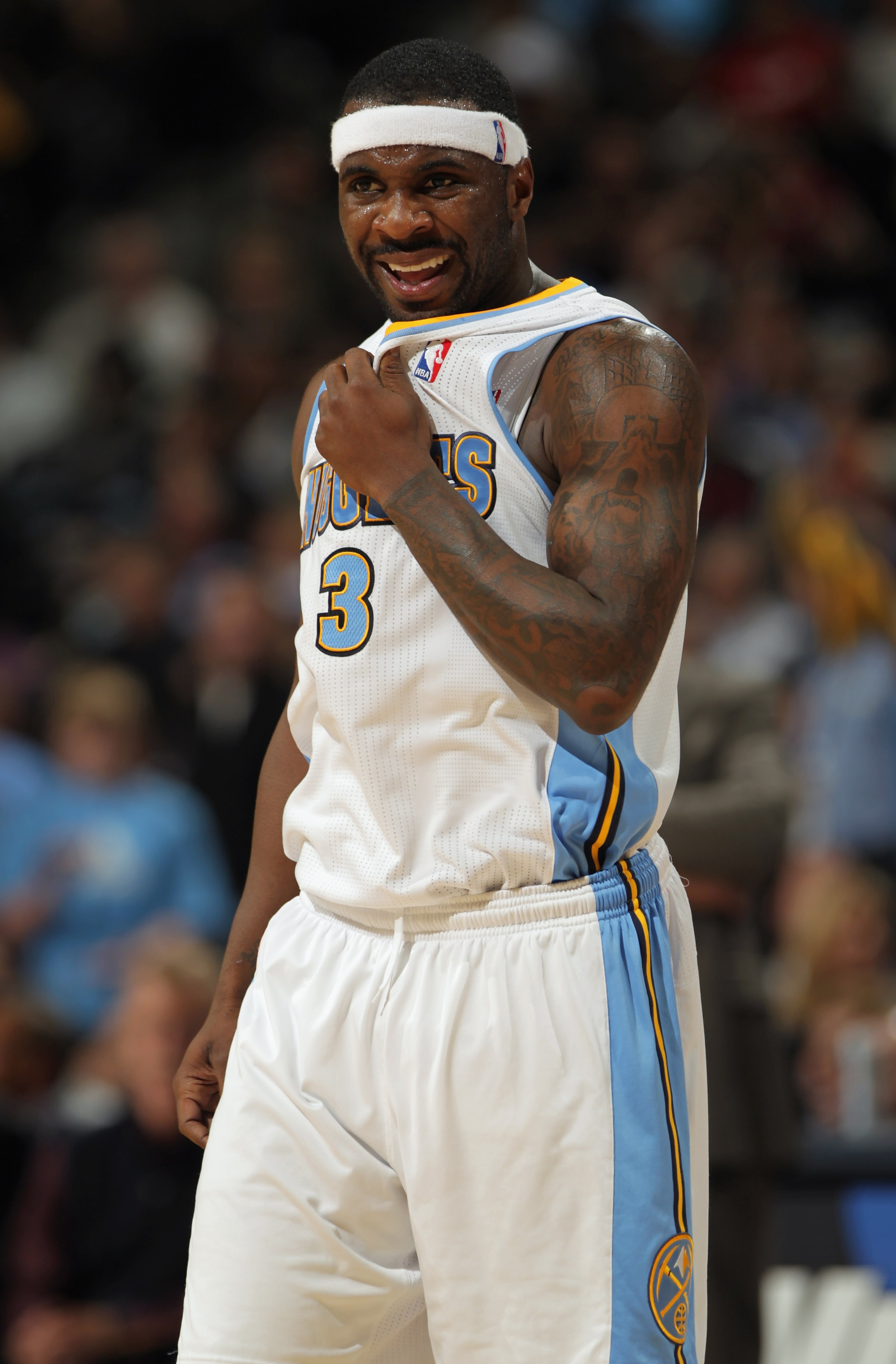 DENVER, CO - MARCH 23: Ty Lawson #3 of the Denver Nuggets looks on against the San Antonio Spurs at the Pepsi Center on March 23, 2011 in Denver, Colorado. The Nuggets defeated the Spurs 115-112. NOTE TO USER: User expressly acknowledges and agrees that, DENVER, CO - MARCH 23: Ty Lawson #3 of the Denver Nuggets looks on against the San Antonio Spurs at the Pepsi Center on March 23, 2011 in Denver, Colorado. The Nuggets defeated the Spurs 115-112. NOTE TO USER: User expressly acknowledges and agrees that,