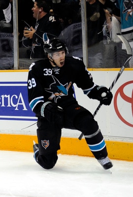 SAN JOSE, CA - APRIL 14: Logan Couture #39 of the San Jose Sharks celebrates after scoring a goal against the Los Angeles Kings in Game One of the Western Conference Quarterfinals  during the 2011 NHL Stanley Cup Playoffs at the HP Pavilion on April 14, 2