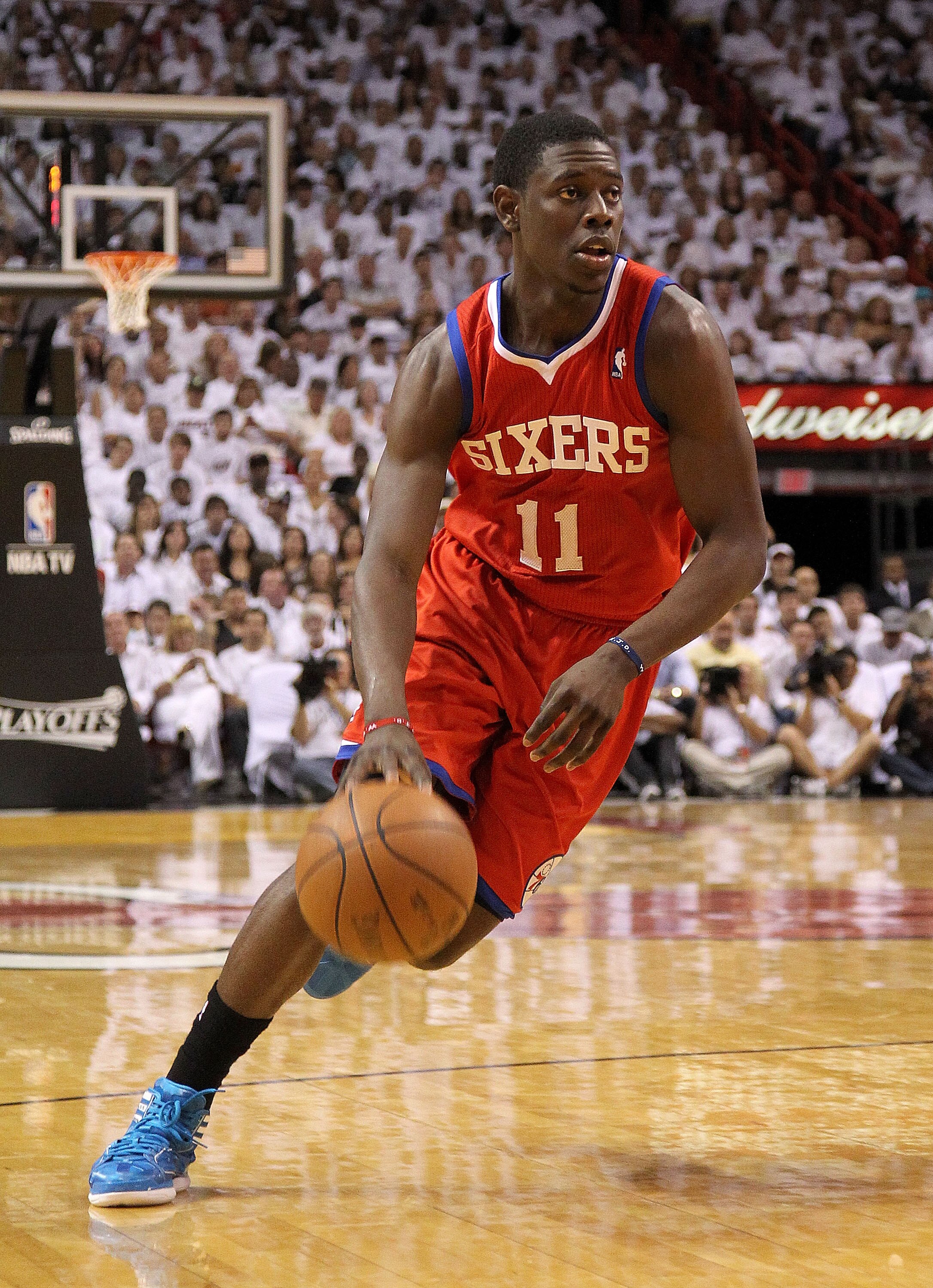 MIAMI, FL - APRIL 18:  Jrue Holiday #11 of the Philadelphia 76ers dribbles   during game two of the Eastern Conference Quarterfinals against the Miami Heat  at American Airlines Arena on April 18, 2011 in Miami, Florida. NOTE TO USER: User expressly ackno