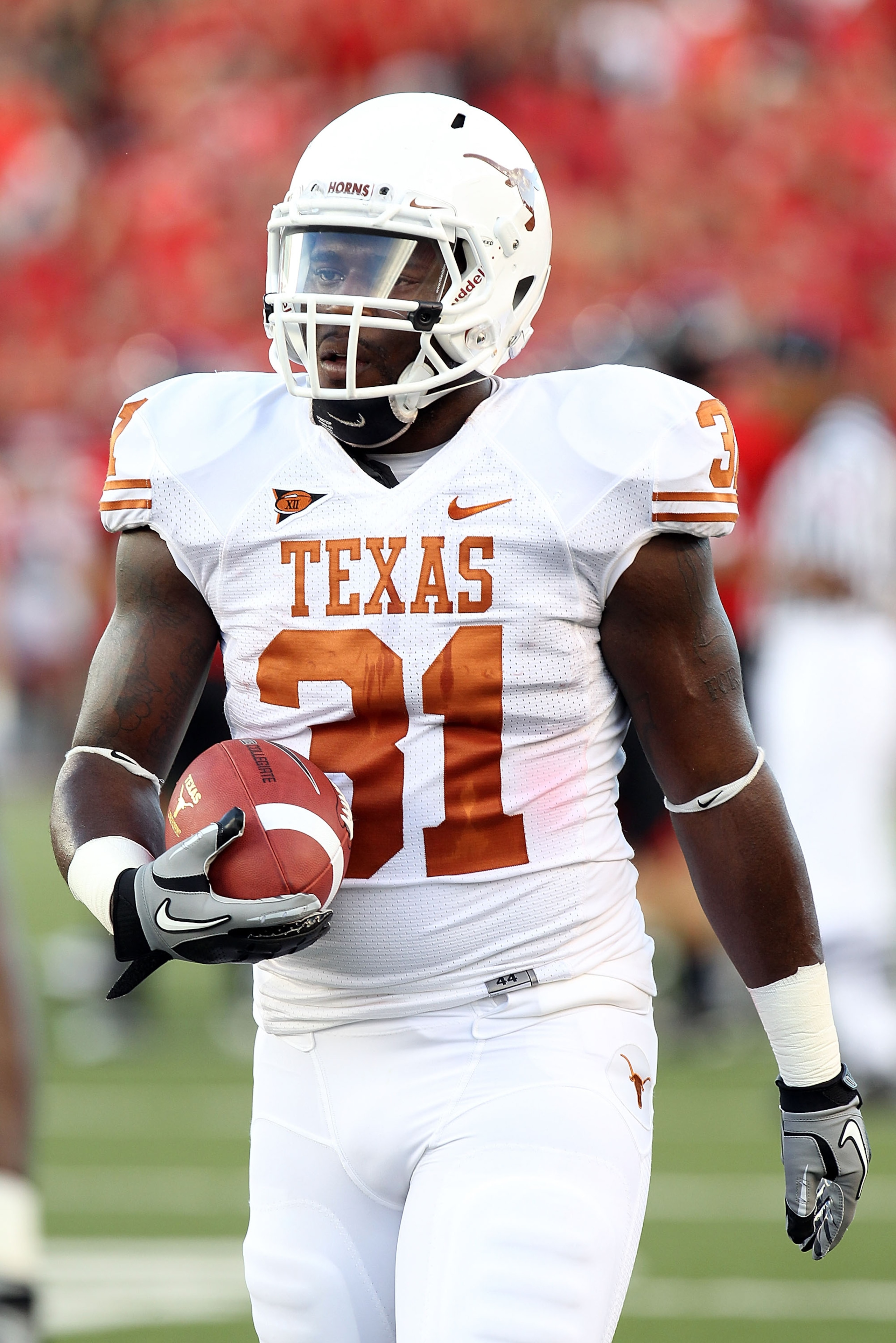 LUBBOCK, TX - SEPTEMBER 18:  Running back Cody Johnson #31 of the Texas Longhorns at Jones AT&T Stadium on September 18, 2010 in Lubbock, Texas.  (Photo by Ronald Martinez/Getty Images)