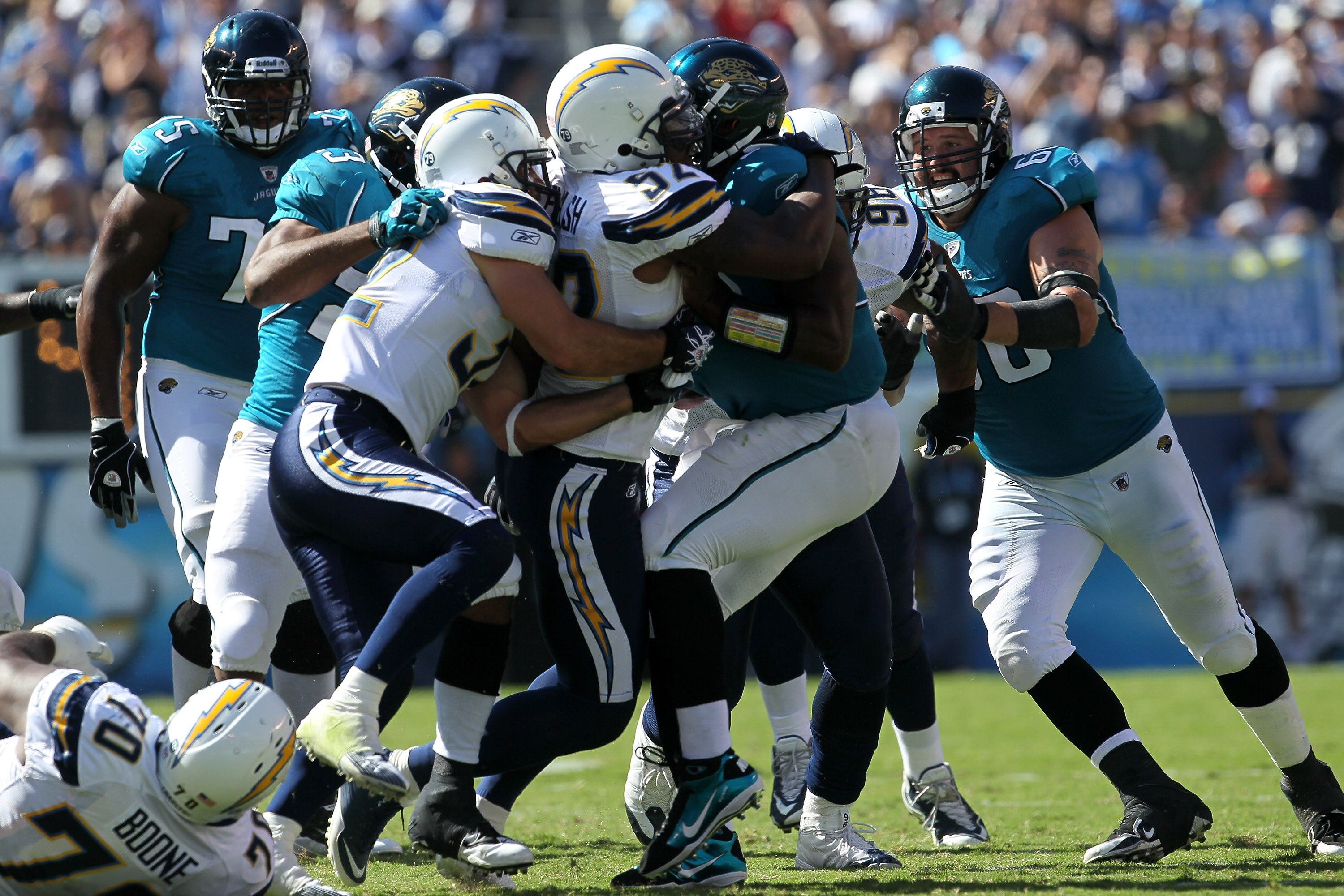 SAN DIEGO - SEPTEMBER 19: Quarterback David Garrard #9 of the Jacksonville Jaguars is sacked by linebacker Larry English #52 and safety Eric Weddle #32 of the San Diego Chargers at Qualcomm Stadium on September 19, 2010 in San Diego, California. The Ch SAN DIEGO - SEPTEMBER 19: Quarterback David Garrard #9 of the Jacksonville Jaguars is sacked by linebacker Larry English #52 and safety Eric Weddle #32 of the San Diego Chargers at Qualcomm Stadium on September 19, 2010 in San Diego, California. The Ch