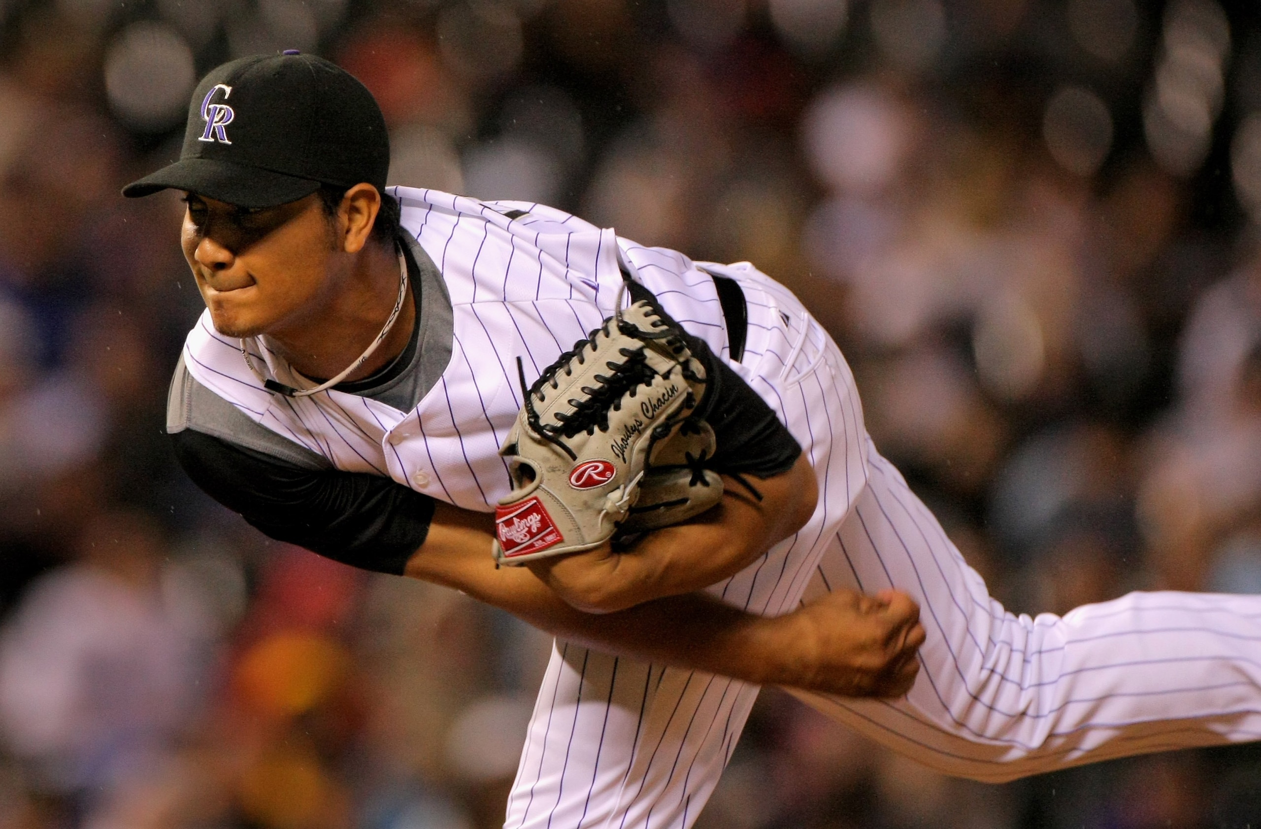 DENVER - JULY 25:  Relief pitcher Jhoulys Chacin #45 of the Colorado Rockies makes his Major League Baseball debut against the San Francisco Giants at Coors Field on July 25, 2009 in Denver, Colorado. The Rockies defeated the Giants 8-2.  (Photo by Doug P