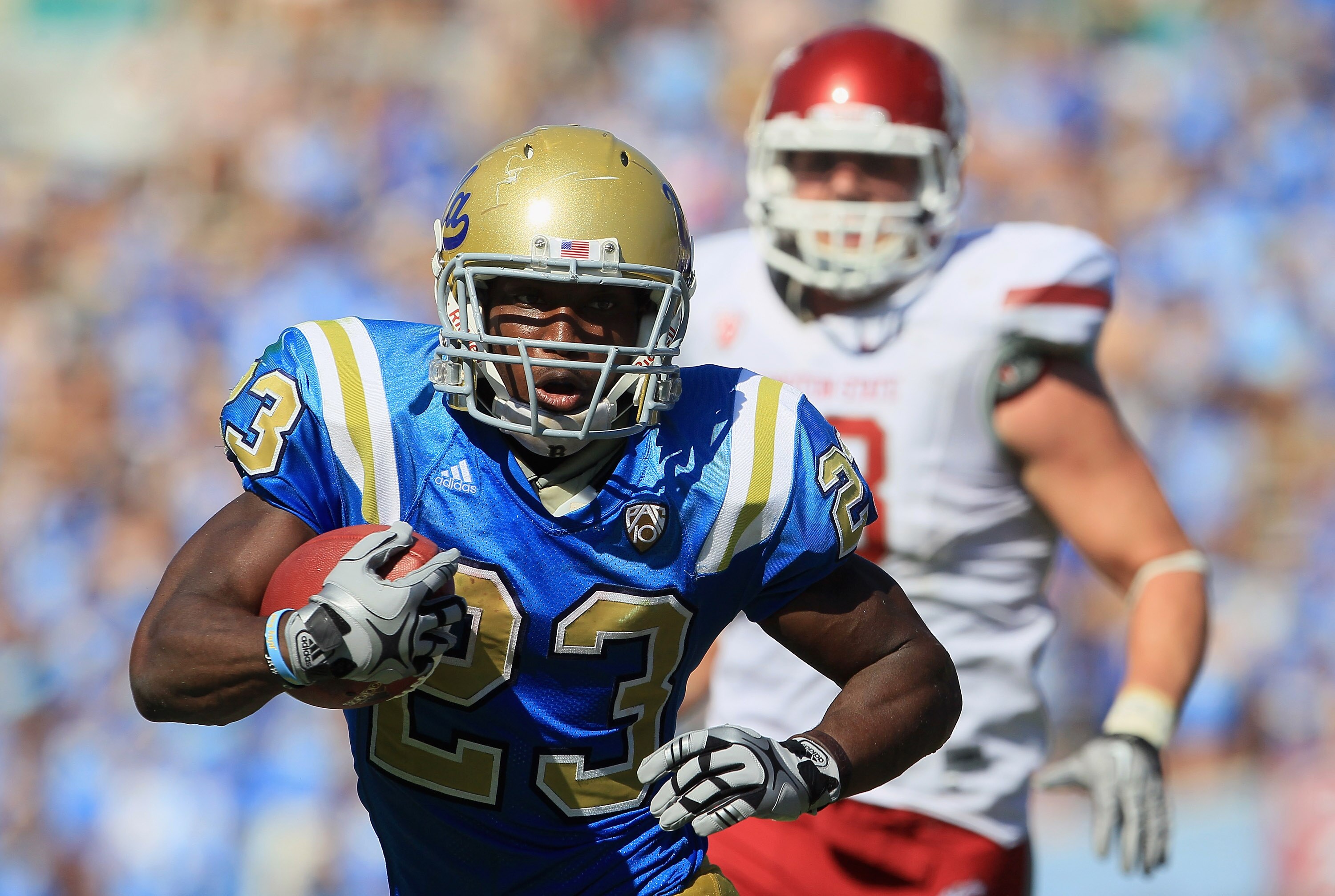 PASADENA, CA - OCTOBER 02:  Running back Johnathan Franklin #23 of the UCLA Bruins carries the ball against the Washington State Cougars during the third quarter at the Rose Bowl on October 2, 2010 in Pasadena, California. UCLA defeated Washington State 4