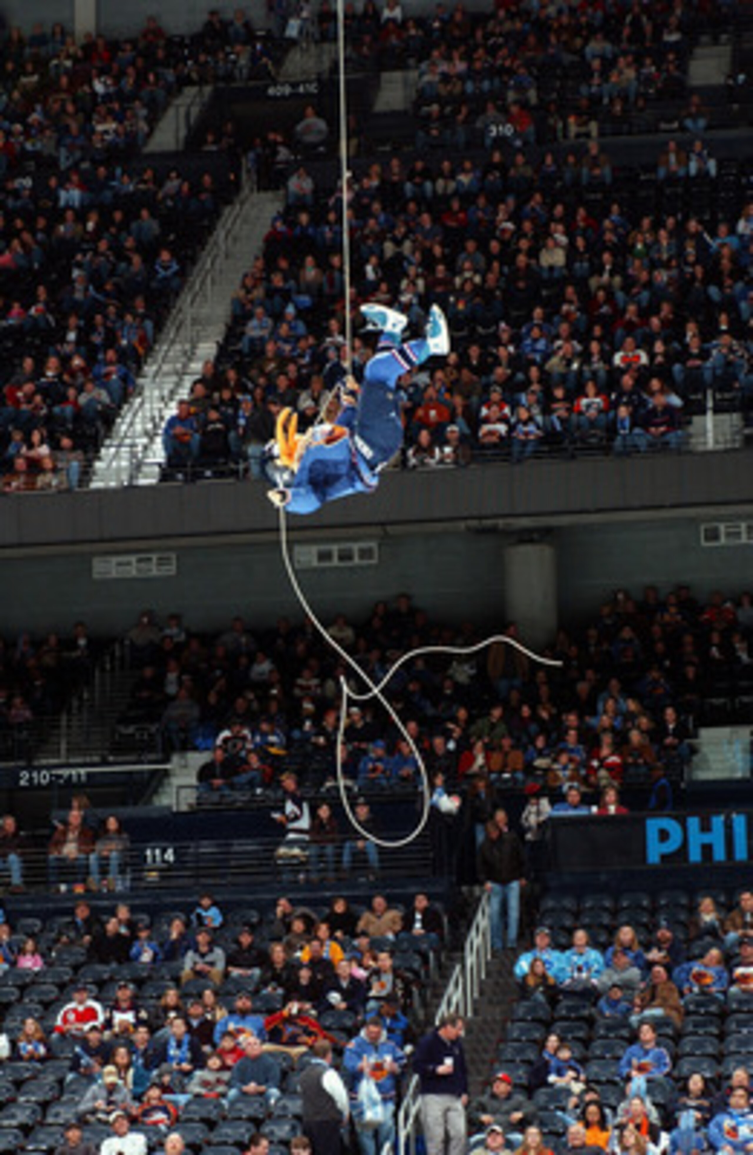 ATLANTA - FEBRUARY 3:  The Atlanta Thrashers mascot Thrash repels onto the ice before the game against the Philadelphia Flyers on February 3, 2007 at Philips Arena in Atlanta, Georgia. The Flyers won 5-2. (Photo by Scott Cunningham/Getty Images)