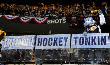 NASHVILLE, TN - APRIL 17:  Team mascot, Gnash, of the Nashville Predators waves a rally towel to motivate the crowd in a game against the Anaheim Ducks in Game Three of the Western Conference Quarterfinals during the 2011 NHL Stanley Cup Playoffs at the B
