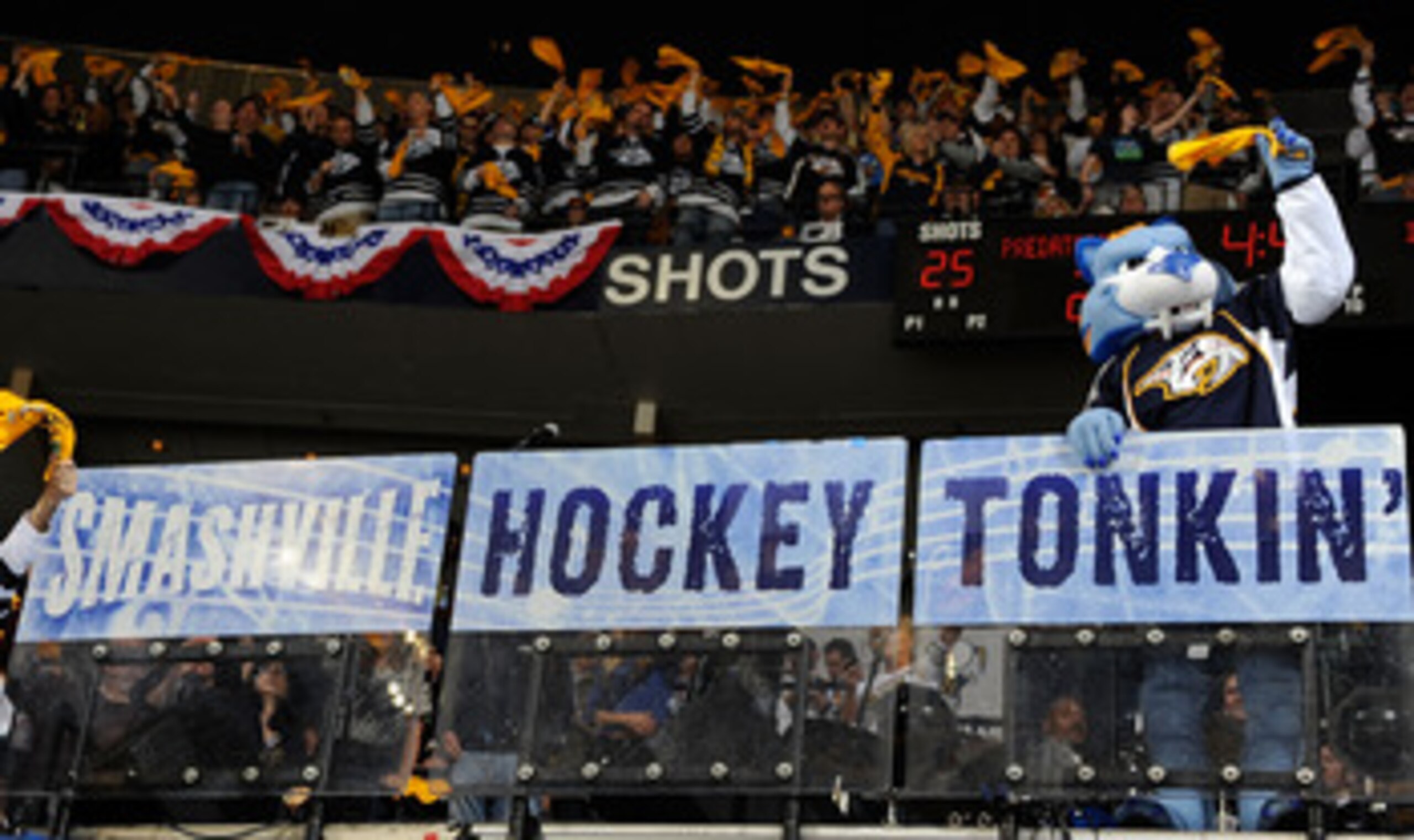 NASHVILLE, TN - APRIL 17:  Team mascot, Gnash, of the Nashville Predators waves a rally towel to motivate the crowd in a game against the Anaheim Ducks in Game Three of the Western Conference Quarterfinals during the 2011 NHL Stanley Cup Playoffs at the B