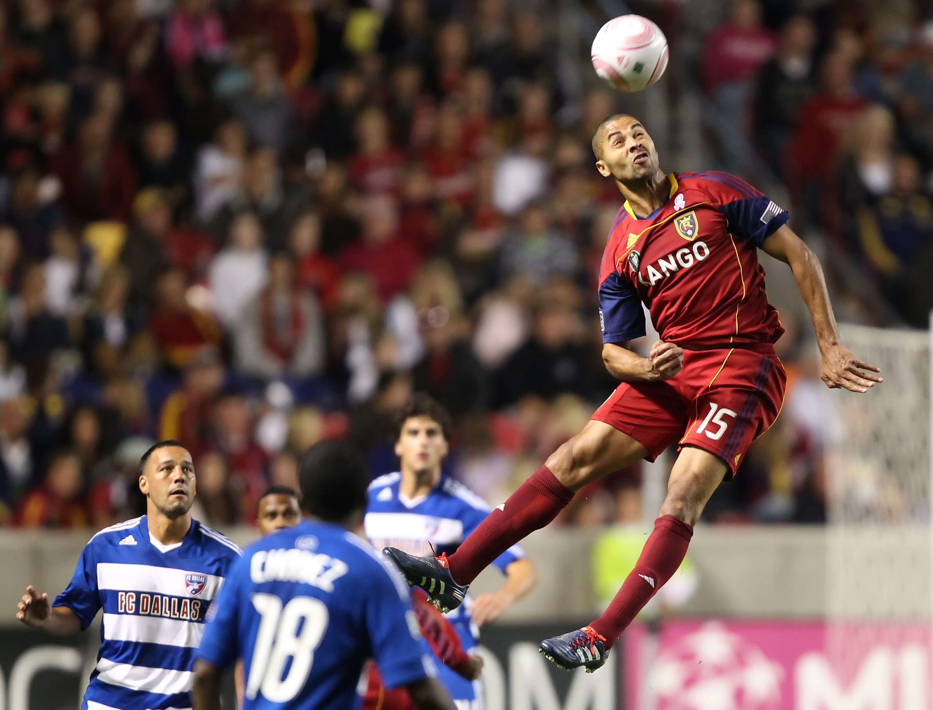 SANDY, UT - SEPTEMBER 16: Alvaro Saborio #15 of Real Salt Lake of heads the ball as Marvin Chavez #18 and Daniel Hernandez #2 FC Dallas looks on during the second half of an MLS soccer game September 16, 2010 at Rio Tinto Stadium in Sandy, Utah. Real Salt