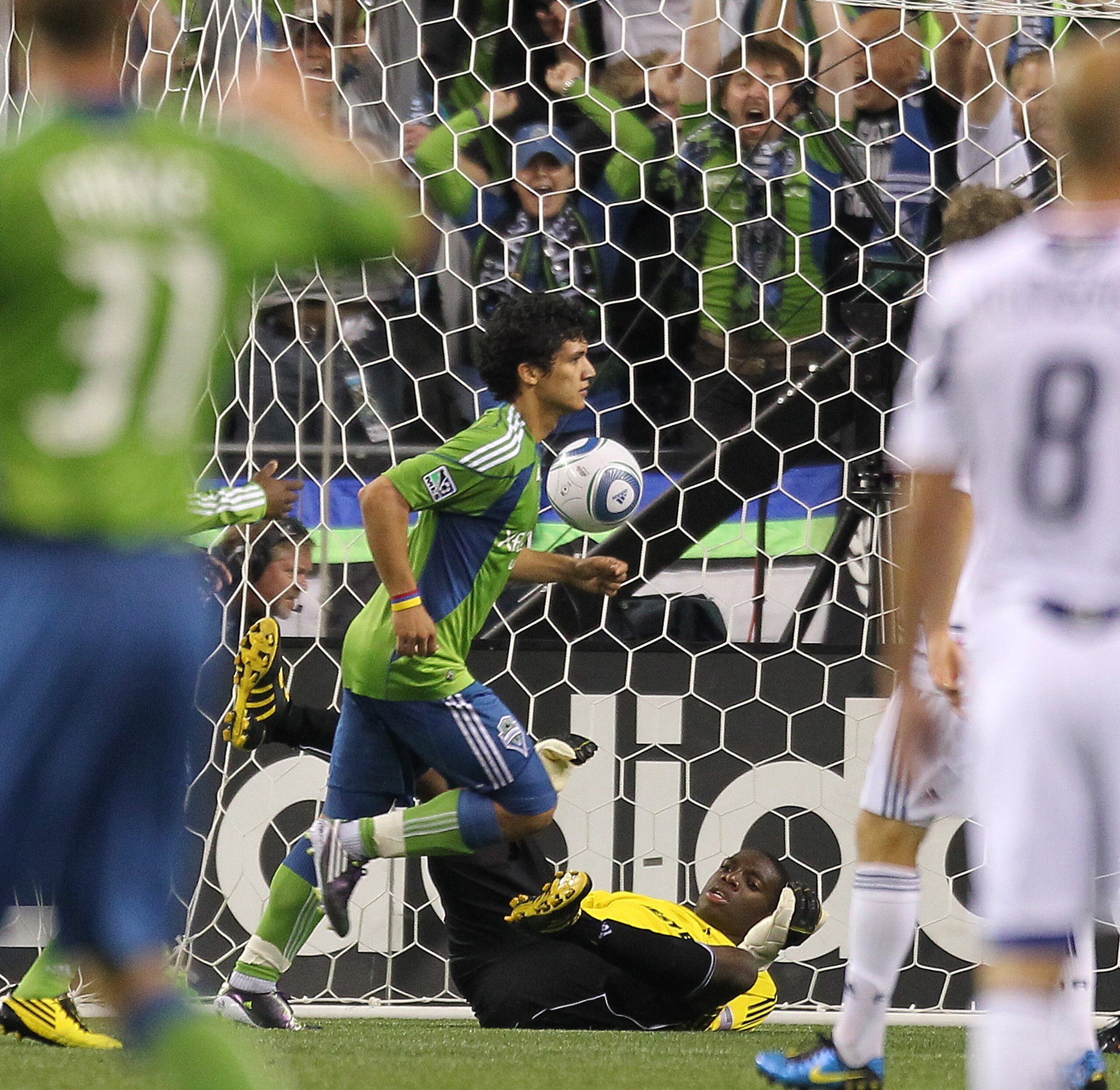 SEATTLE - AUGUST 28: Fredy Montero #17 of the Seattle Sounders FC runs past goalkeeper Sean Johnson #25 after scoring the second goal against the Chicago Fire on August 28, 2010 at Qwest Field in Seattle, Washington. (Photo by Otto Greule Jr/Getty Image SEATTLE - AUGUST 28: Fredy Montero #17 of the Seattle Sounders FC runs past goalkeeper Sean Johnson #25 after scoring the second goal against the Chicago Fire on August 28, 2010 at Qwest Field in Seattle, Washington. (Photo by Otto Greule Jr/Getty Image