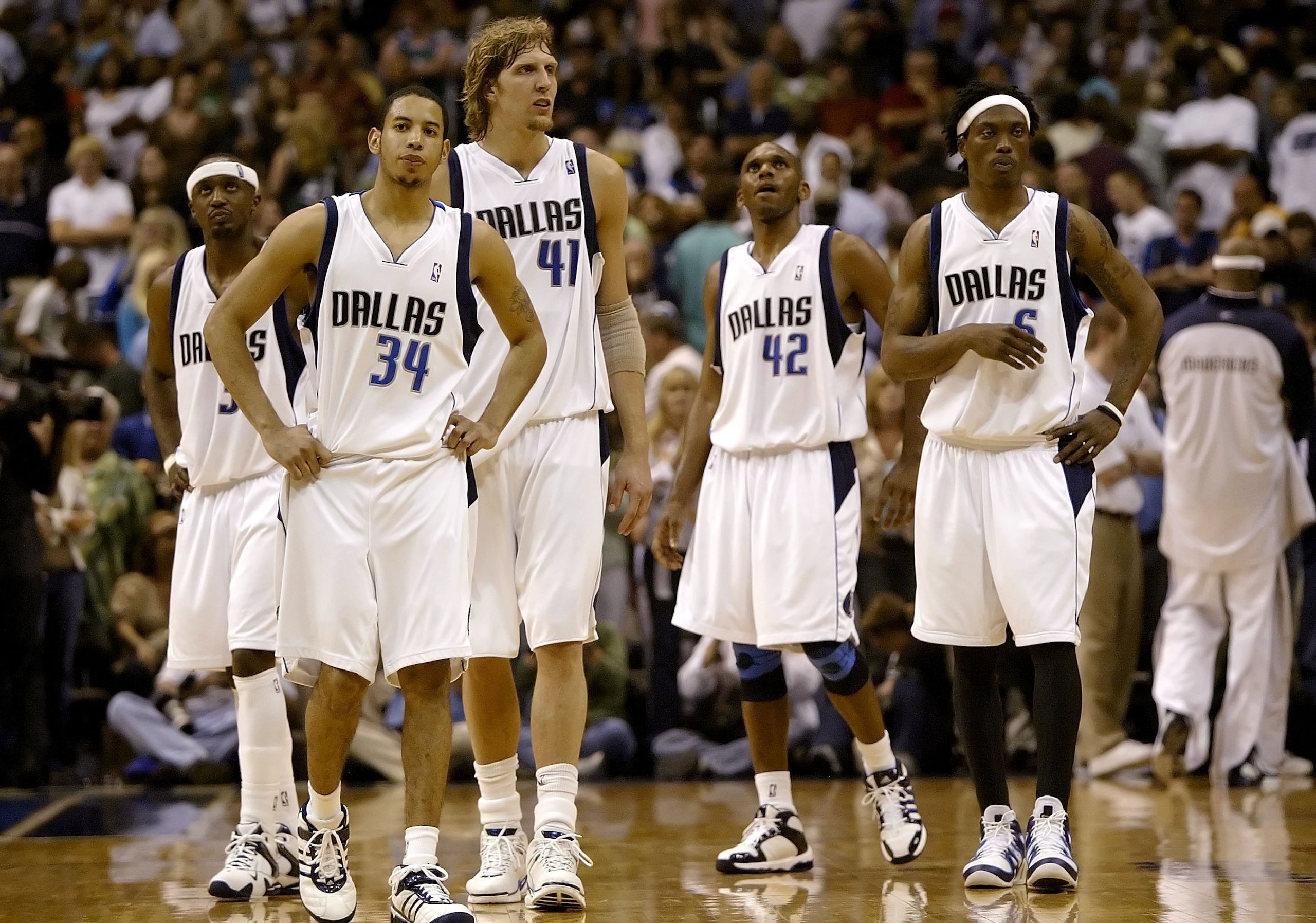 DALLAS - MAY 24: (L-R) Jason Terry #31, Devin Harris #34, Dirk Nowitzki #41, Jerry Stackhouse #42 and Marquis Daniels #6 of the Dallas Mavericks return to the court after giving up the lead to the Phoenix Suns in game one of the Western Conference Finals DALLAS - MAY 24: (L-R) Jason Terry #31, Devin Harris #34, Dirk Nowitzki #41, Jerry Stackhouse #42 and Marquis Daniels #6 of the Dallas Mavericks return to the court after giving up the lead to the Phoenix Suns in game one of the Western Conference Finals