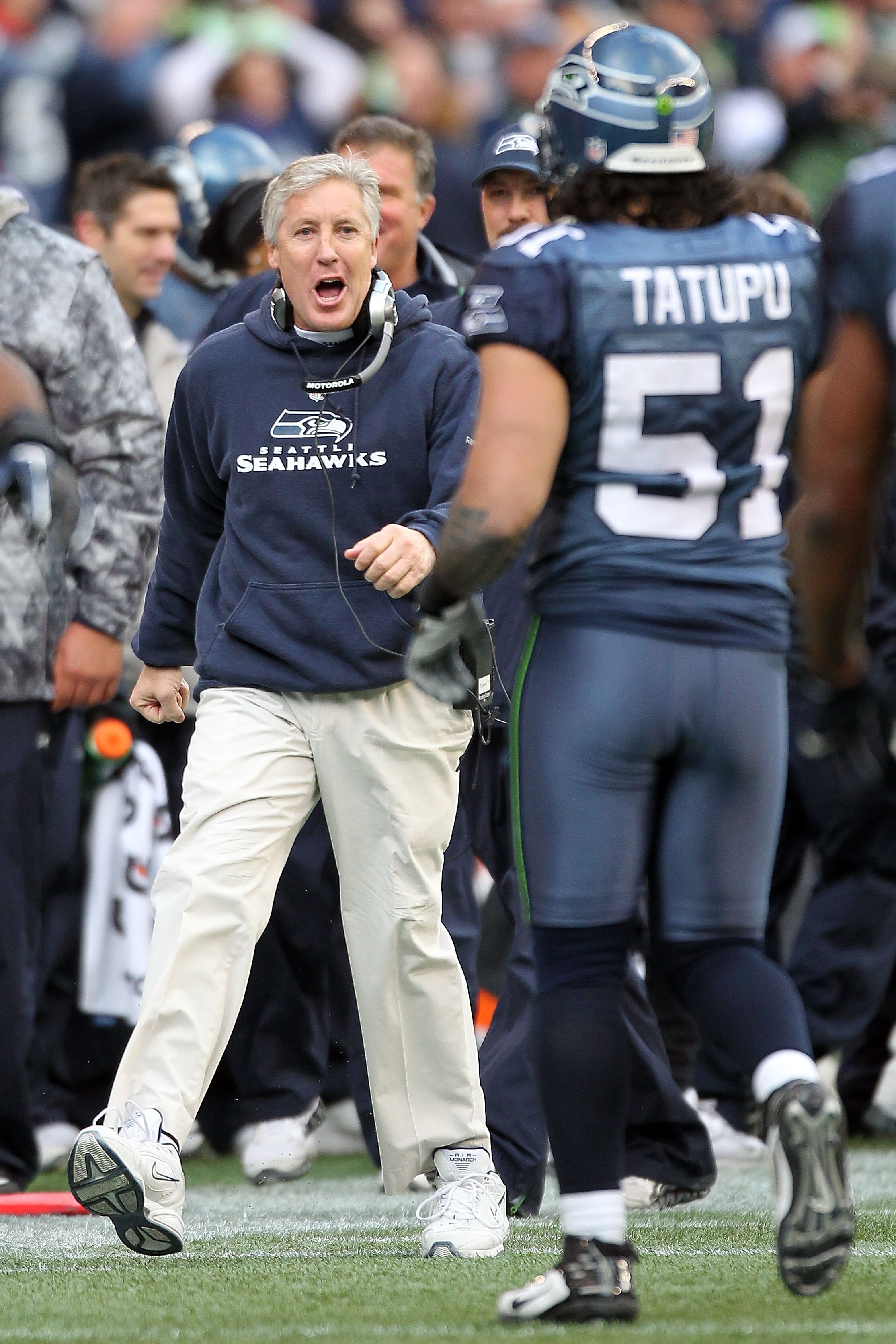 SEATTLE, WA - JANUARY 08:  Head coach Pete Carroll of the Seattle Seahawks reacts in the second quarter with Lofa Tatupu #51 against the New Orleans Saints during the 2011 NFC wild-card playoff game at Qwest Field on January 8, 2011 in Seattle, Washington