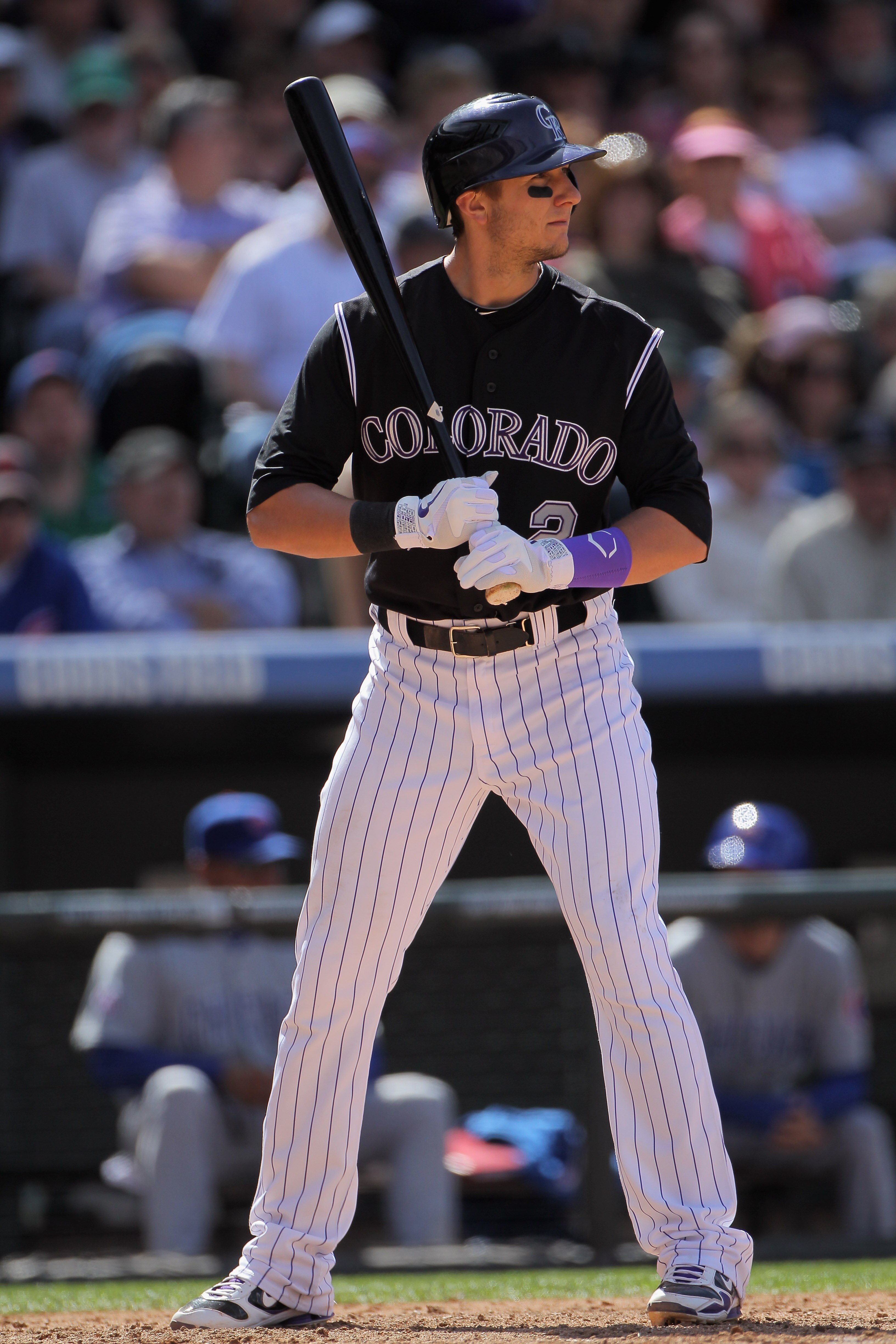 DENVER, CO - APRIL 17:  Troy Tulowitzki #2 of the Colorado Rockies takes an at bat against the Chicago Cubs at Coors Field on April 17, 2011 in Denver, Colorado.  (Photo by Doug Pensinger/Getty Images)