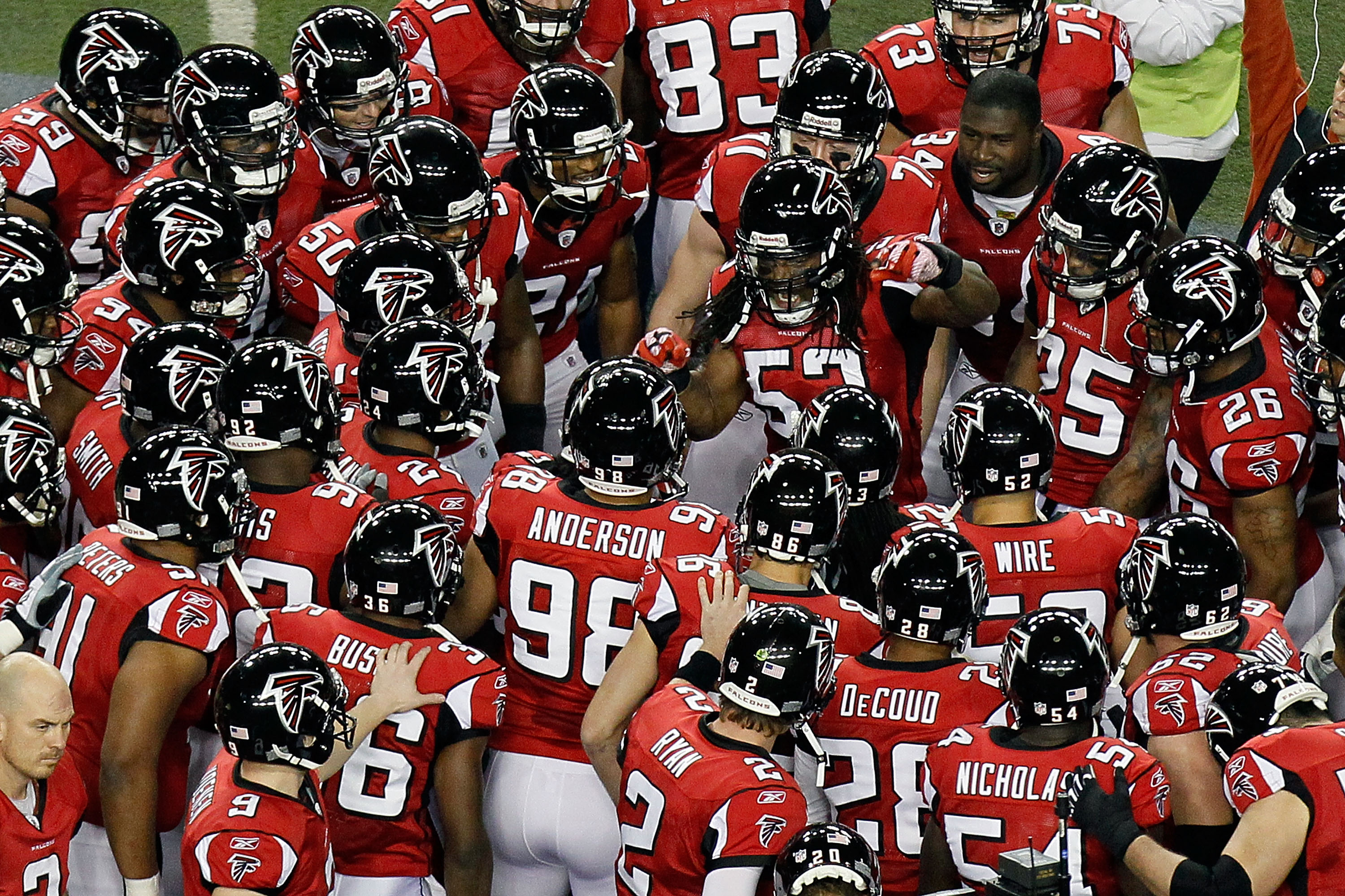 ATLANTA, GA - JANUARY 15:  Mike Peterson #53 of the Atlanta Falcons leads his team in a pregame huddle against the Green Bay Packers during their 2011 NFC divisional playoff game at Georgia Dome on January 15, 2011 in Atlanta, Georgia.  (Photo by Kevin C.