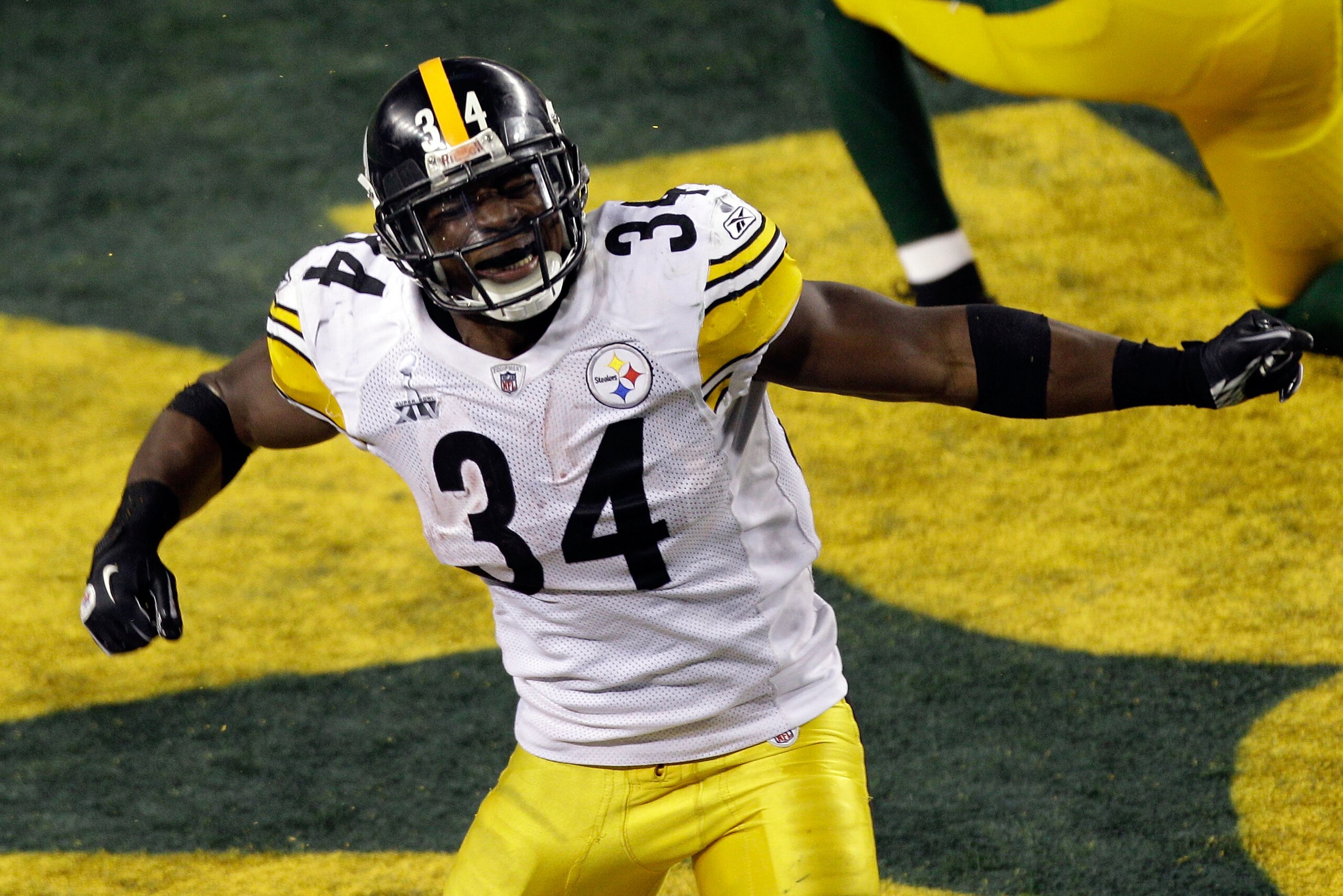 ARLINGTON, TX - FEBRUARY 06:  Rashard Mendenhall #34 of the Pittsburgh Steelers celebrates after running for an eight yard touchdown against the Green Bay Packers in the third quarter during Super Bowl XLV at Cowboys Stadium on February 6, 2011 in Arlingt