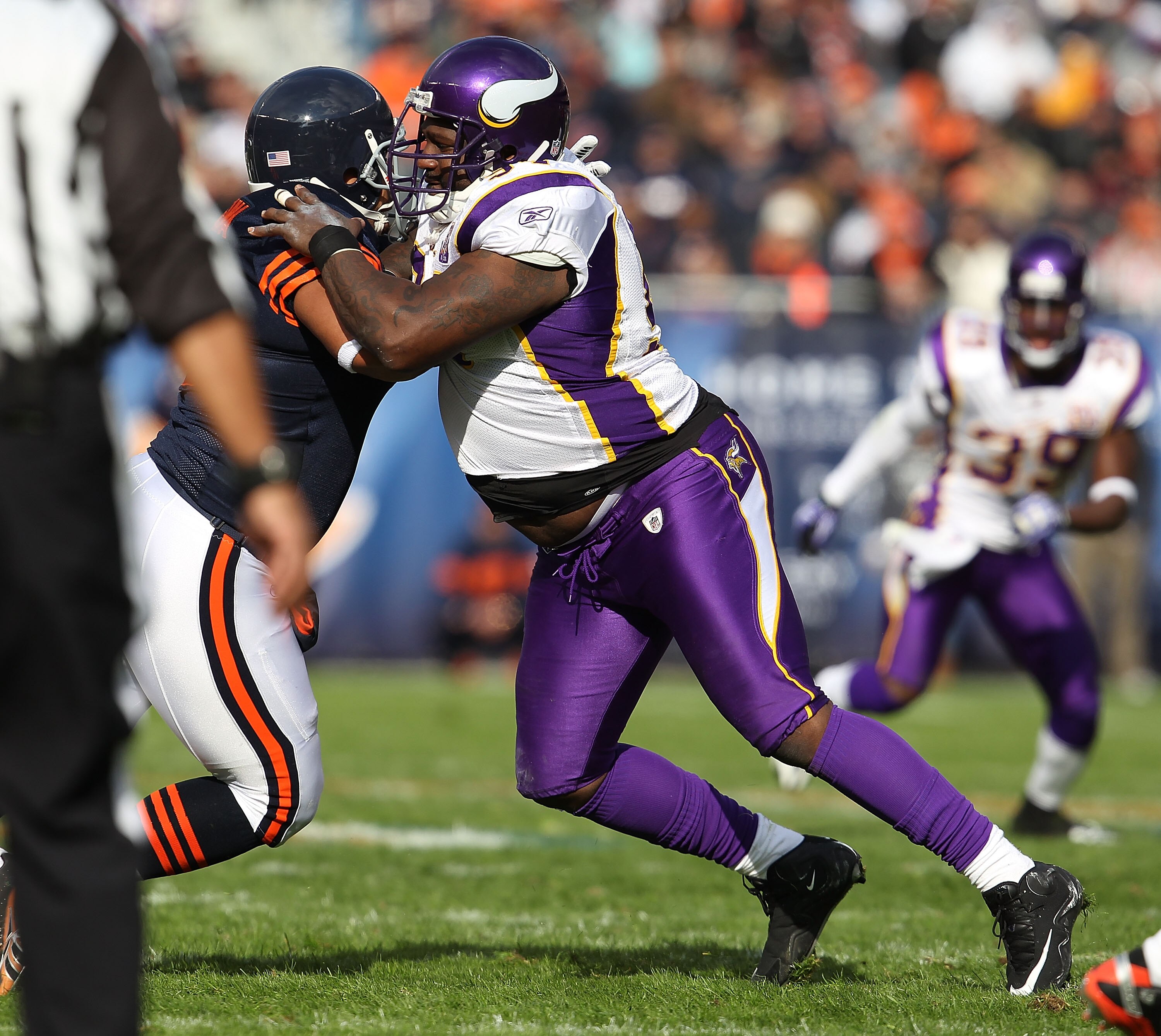 CHICAGO - NOVEMBER 14: Pat Williams #94 of the Minnesota Vikings works against Brandon Manumaleuna #86 of the Chicago Bears at Soldier Field on November 14, 2010 in Chicago, Illinois. The Bears defeated the Vikings 27-13. (Photo by Jonathan Daniel/Getty I