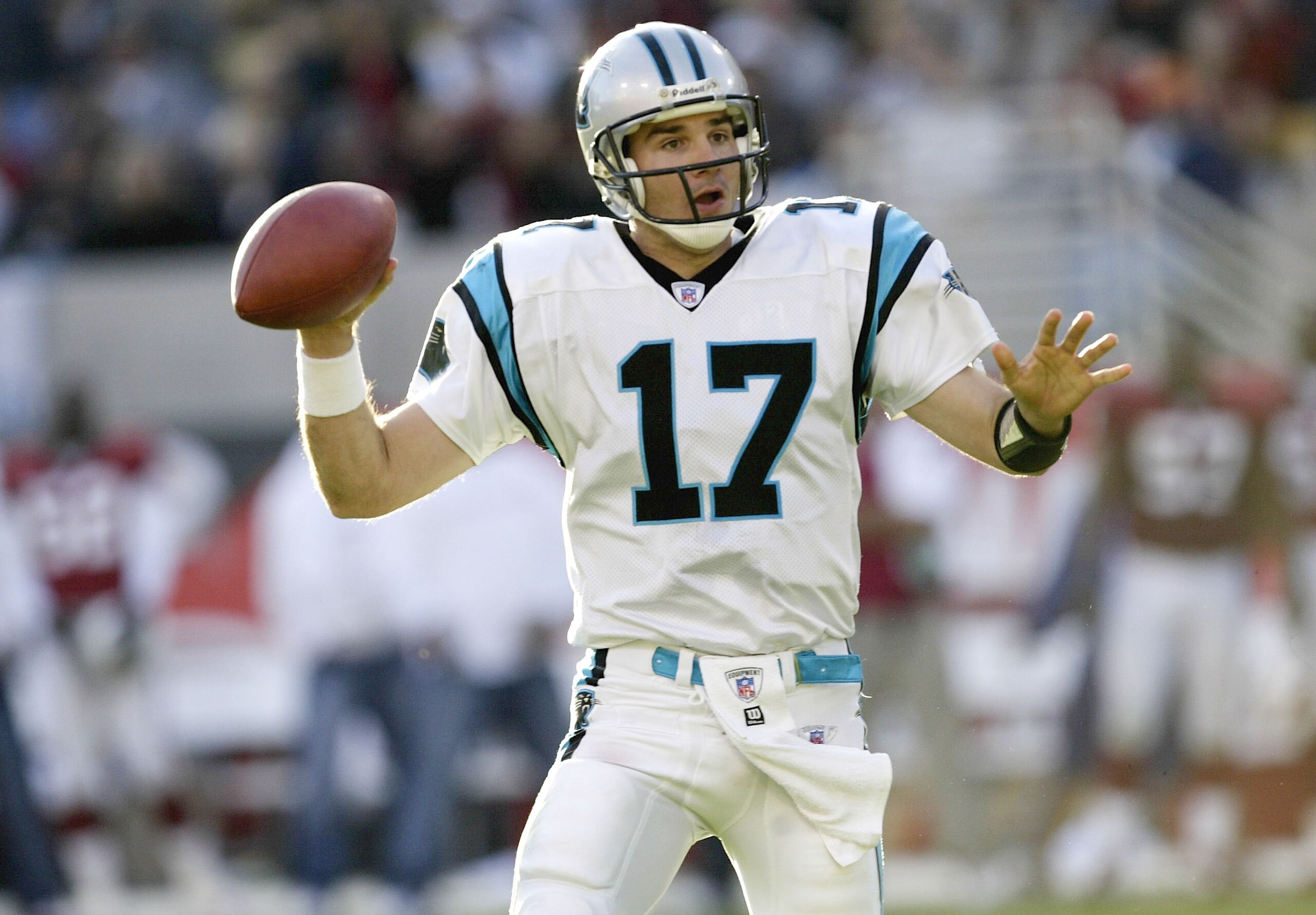 PHOENIX, AZ - DECEMBER 14:  Quarterback Jack Delhomme #17 of the Carolina Panthers throws a pass against the Arizona Cardinals on December 14, 2003 at Sun Devil Stadium in Phoenix, Arizona. Carolina won 20-17.  (Photo by Stephen Dunn/Getty Images)