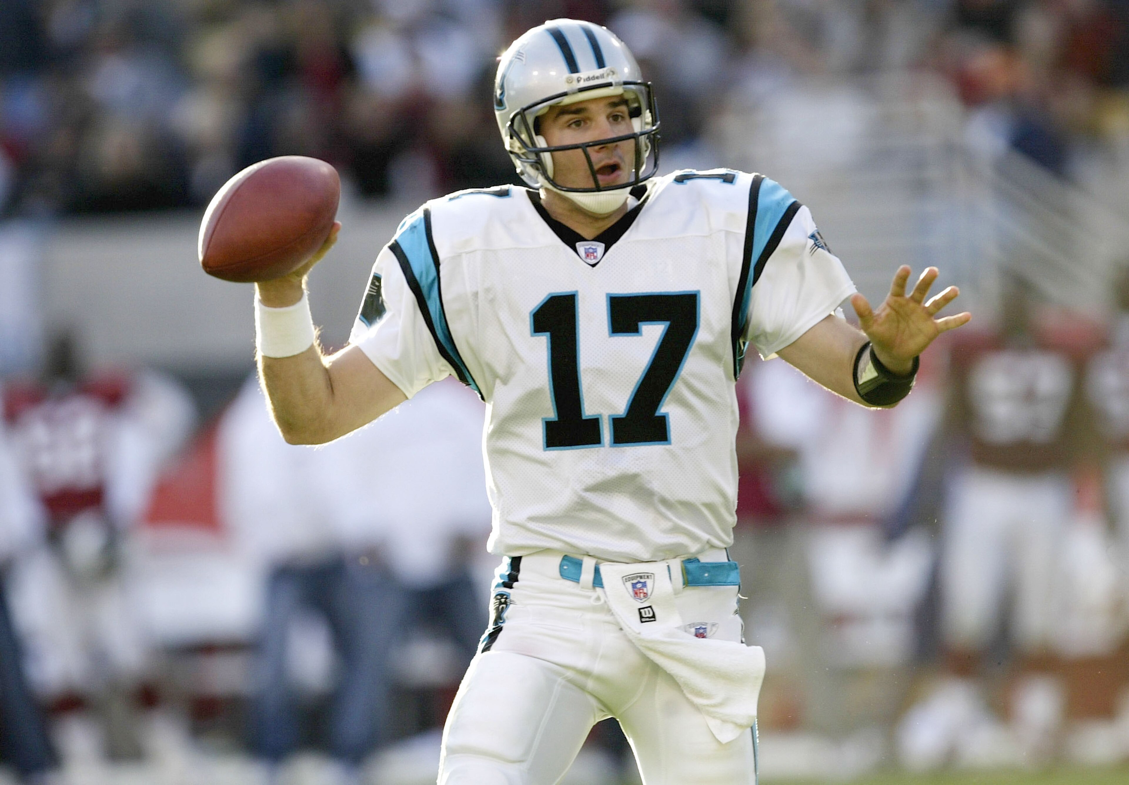 PHOENIX, AZ - DECEMBER 14:  Quarterback Jack Delhomme #17 of the Carolina Panthers throws a pass against the Arizona Cardinals on December 14, 2003 at Sun Devil Stadium in Phoenix, Arizona. Carolina won 20-17.  (Photo by Stephen Dunn/Getty Images)