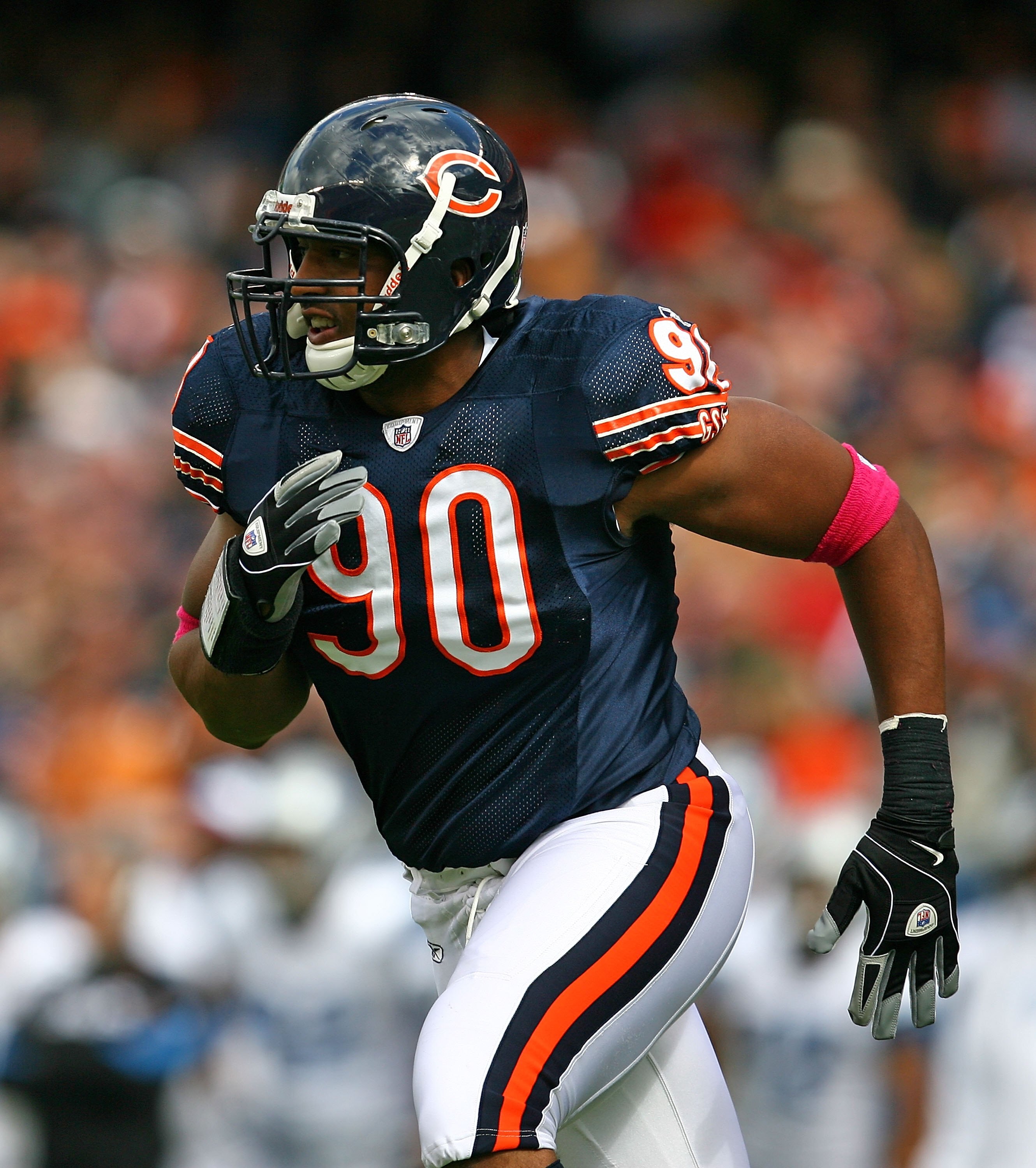 CHICAGO - OCTOBER 04: Jarron Gilbert #90 of the Chicago Bears chases a Detroit Lion runner on October 4, 2009 at Soldier Field in Chicago, Illinois. The Bears defeated the Lions 48-24. (Photo by Jonathan Daniel/Getty Images) CHICAGO - OCTOBER 04: Jarron Gilbert #90 of the Chicago Bears chases a Detroit Lion runner on October 4, 2009 at Soldier Field in Chicago, Illinois. The Bears defeated the Lions 48-24. (Photo by Jonathan Daniel/Getty Images)