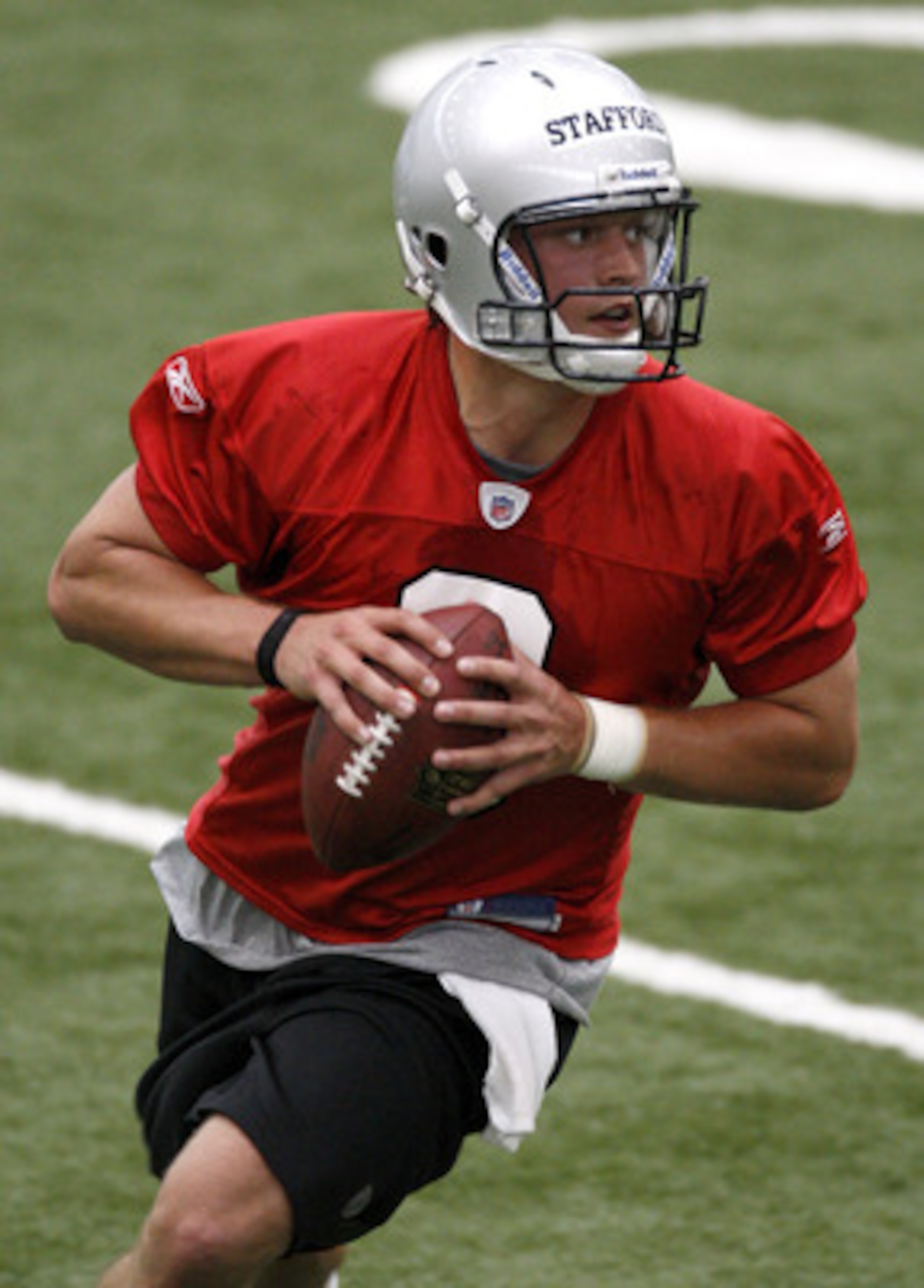 ALLEN PARK, MI - MAY 01:  Matt Stafford #9 of the Detroit Lions looks to throw during rookie orientation camp at the Detroit Lions Headquarters and Training Facility on May 1, 2009 in Allen Park, Michigan.  (Photo by Gregory Shamus/Getty Images)
