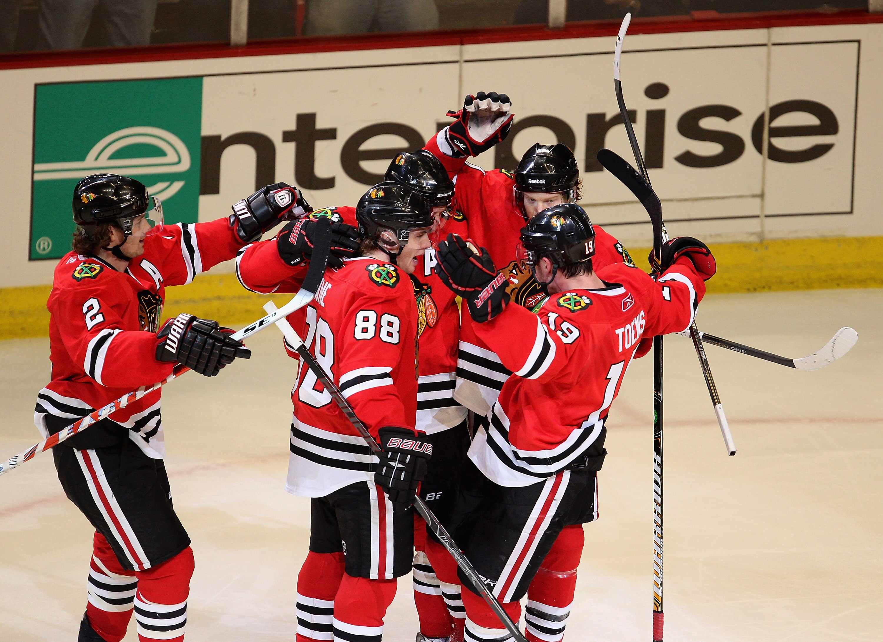 CHICAGO, IL - APRIL 17: (L-R) Duncan Keith #2, Patrick Kane #88, Patrick Sharp #10, Brian Campbell #51 and Jonathan Toews #19 of the Chicago Blackhawks celebrate a 2nd period goal against the Vancouver Canucks in Game Three of the Western Conference Quart