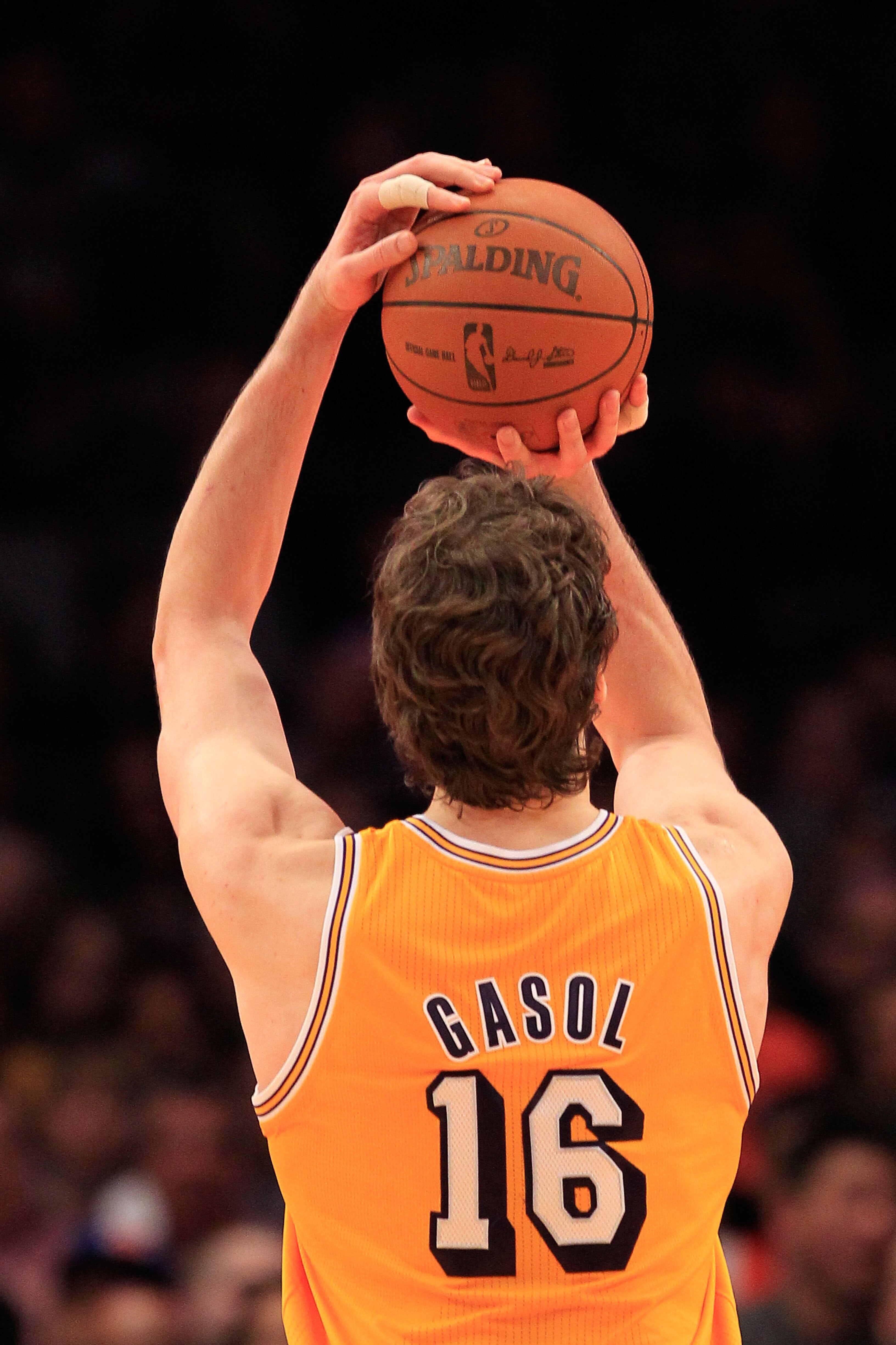 NEW YORK, NY - FEBRUARY 11: Pau Gasol #16 of the Los Angeles Lakers shoots a free throw against the New York Knicks at Madison Square Garden on February 11, 2011 in New York City. NOTE TO USER: User expressly acknowledges and agrees that, by downloading a