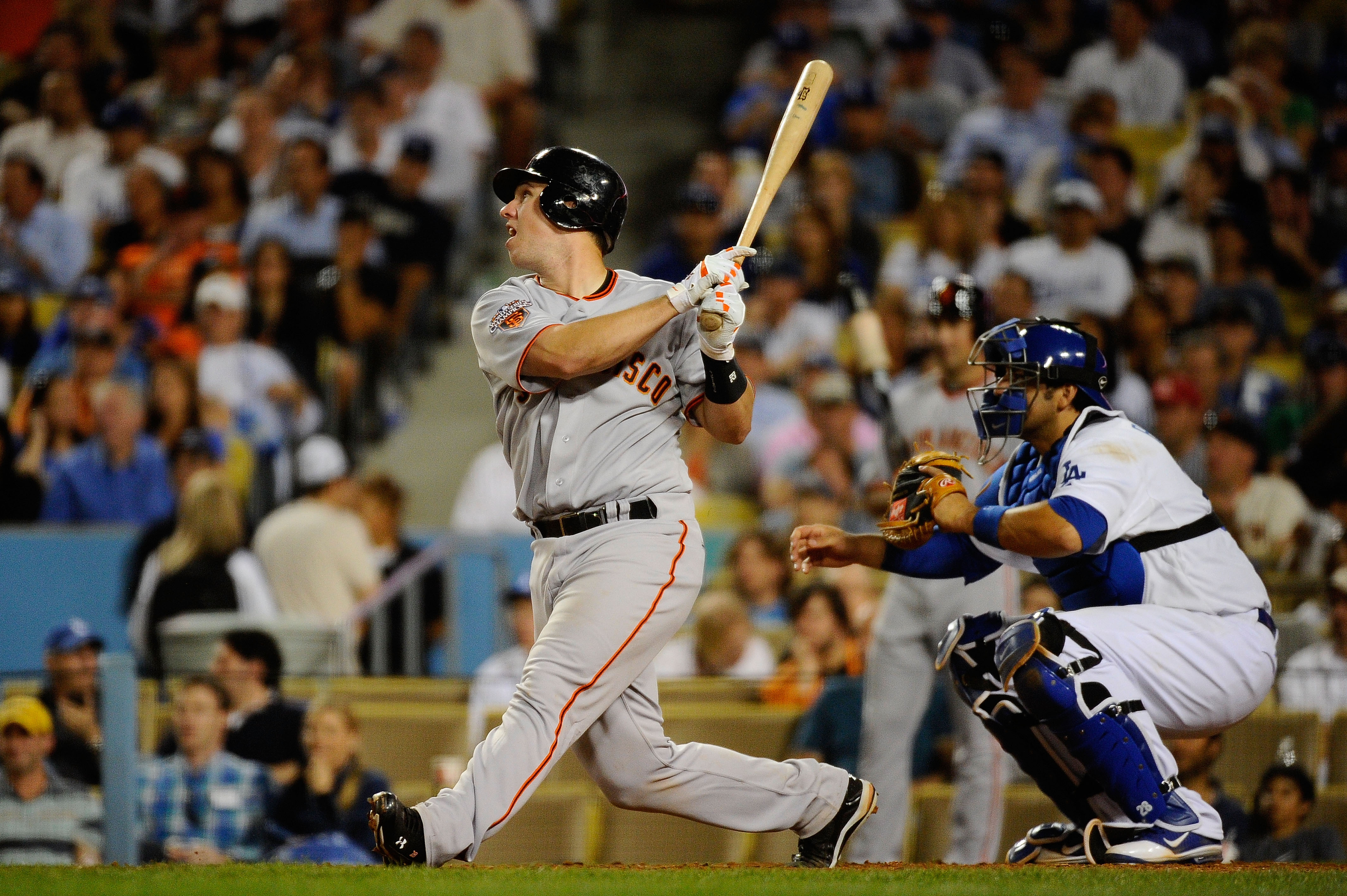 LOS ANGELES, CA - MARCH 31:  Buster Posey #28 of the San Francisco Giants grounds out against the Los Angeles Dodgers on Opening Day at Dodger Stadium on March 31, 2011 in Los Angeles, California.  (Photo by Kevork Djansezian/Getty Images)