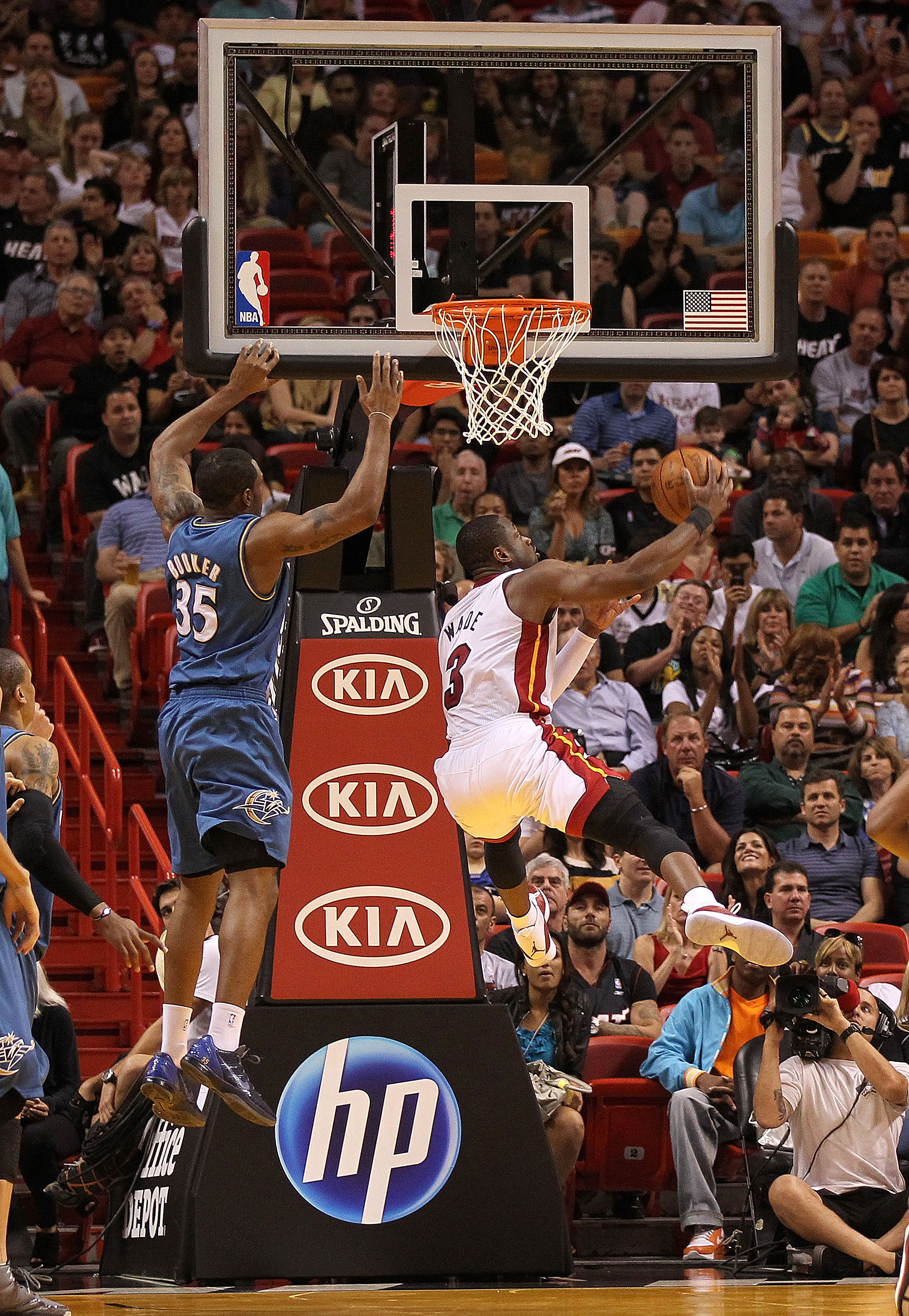 MIAMI, FL - FEBRUARY 25: Dwyane Wade #3 of the Miami Heat takes an off-balance shot during a game against the Washington Wizards at American Airlines Arena on February 25, 2011 in Miami, Florida. NOTE TO USER: User expressly acknowledges and agrees that,