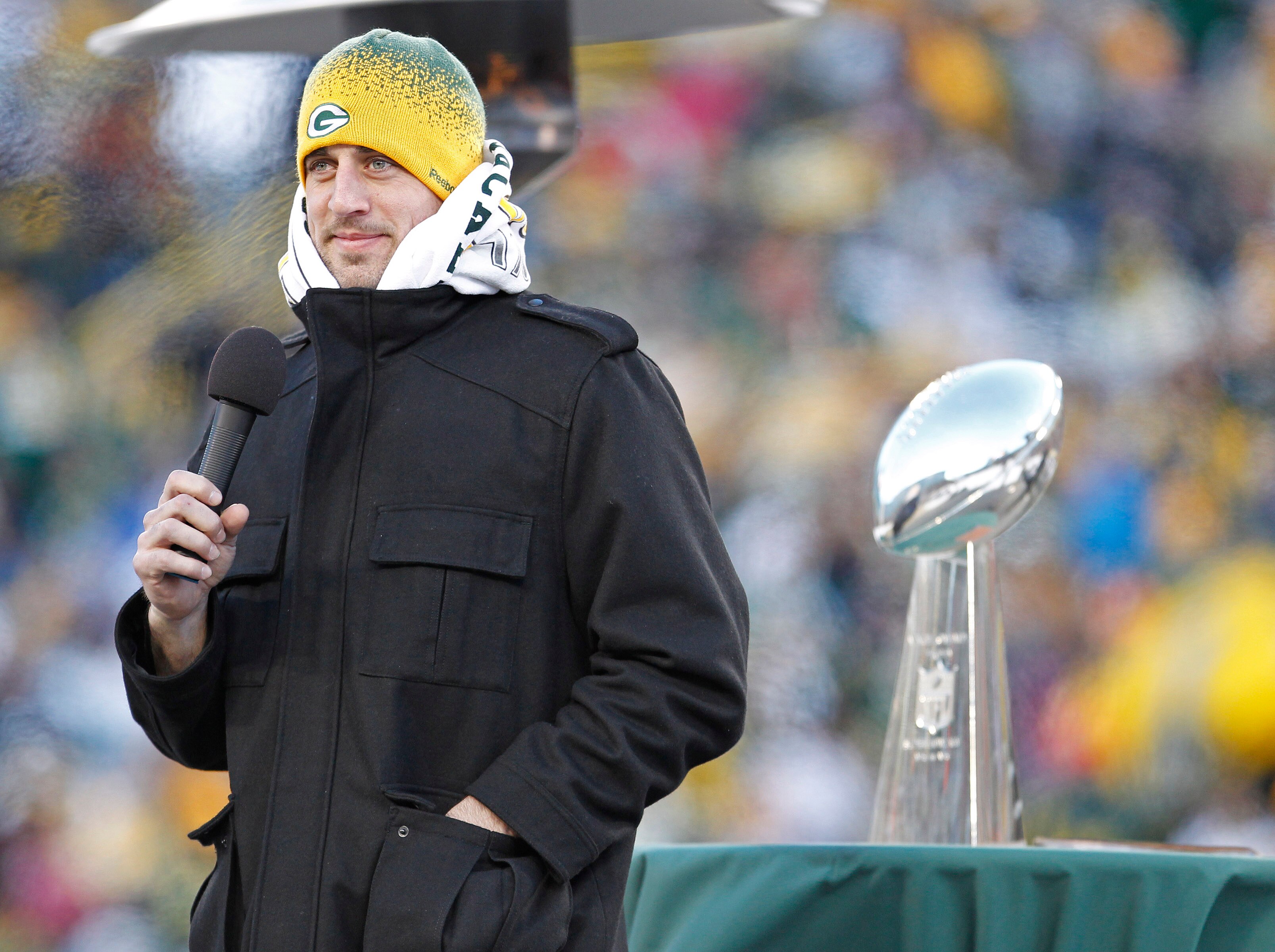 GREEN BAY, WI - FEBRUARY 08:  Green Bay Packers quarterback Aaron Rodgers addresses  the fans at Lambeau Field during the Packers victory ceremony on February 8, 2011 in Green Bay, Wisconsin.  (Photo by Matt Ludtke/Getty Images)