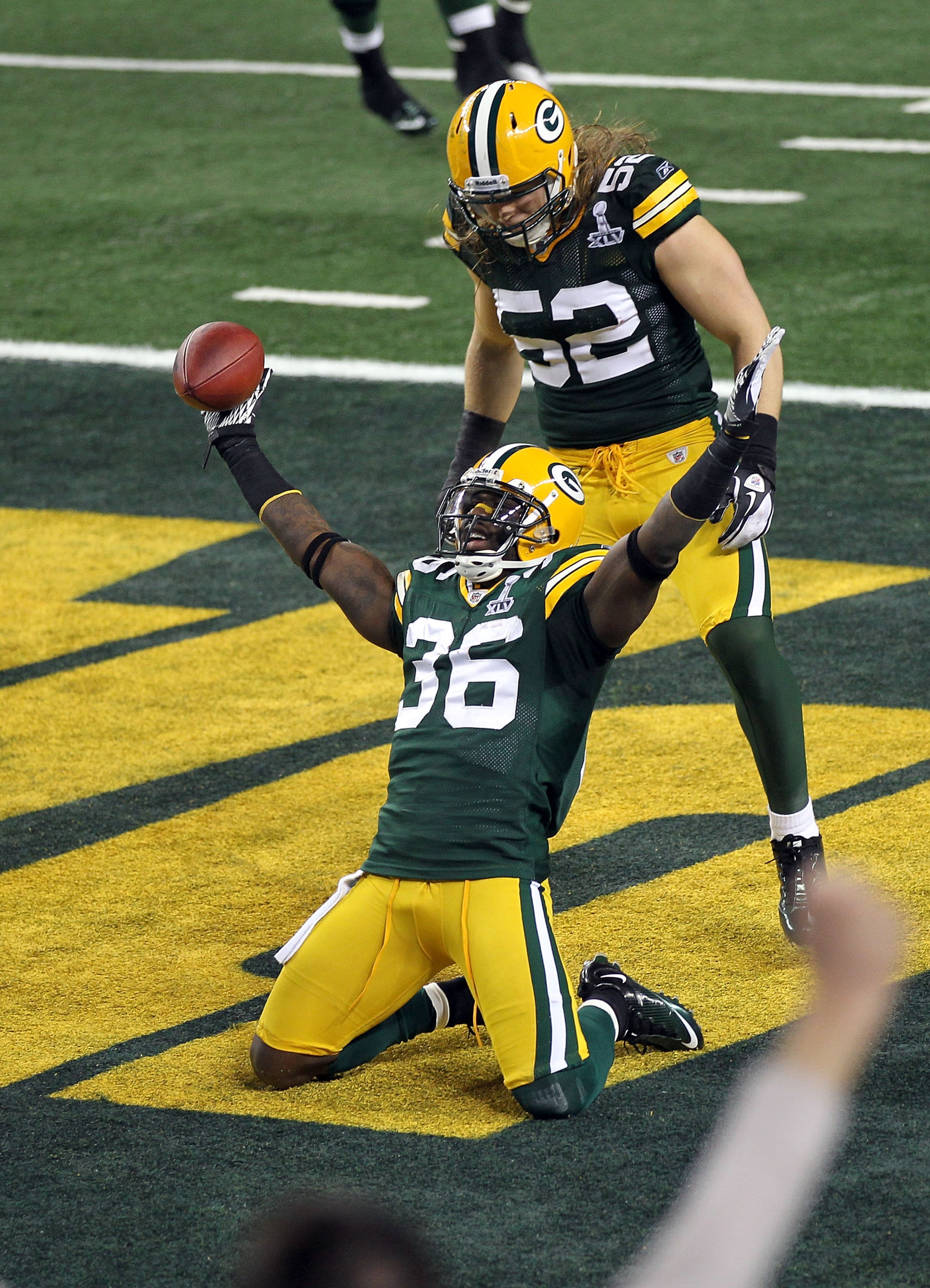 ARLINGTON, TX - FEBRUARY 06: Nick Collins #36 of the Green Bay Packers celebrates with teammate Clay Matthews #52 after Collins returned an interception for a touchdown against the Pittsburgh Steelers during Super Bowl XLV at Cowboys Stadium on February ARLINGTON, TX - FEBRUARY 06: Nick Collins #36 of the Green Bay Packers celebrates with teammate Clay Matthews #52 after Collins returned an interception for a touchdown against the Pittsburgh Steelers during Super Bowl XLV at Cowboys Stadium on February