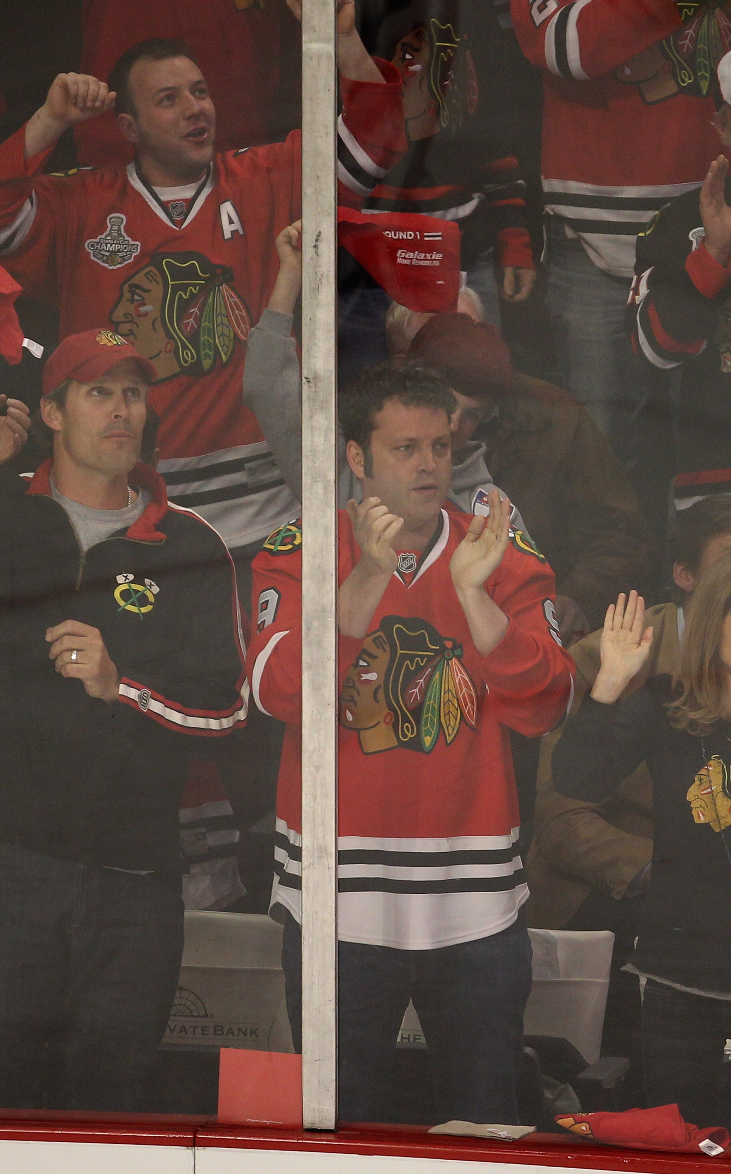 CHICAGO, IL - APRIL 17: Actor Vince Vaughn watches as the Chicago Blackhawks take on the Vancouver Canucks in Game Three of the Western Conference Quarterfinals during the 2011 NHL Stanley Cup Playoffs at the United Center on April 17, 2011 in Chicago, Il