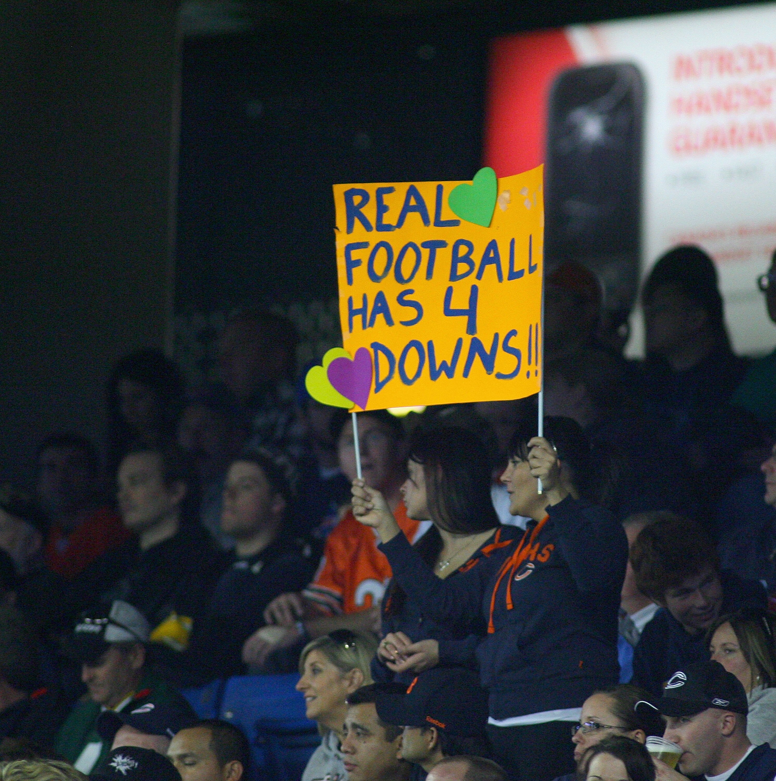 TORONTO, ON - NOVEMBER 07: A fan of the Buffalo Bills shows a sign comparing NFL football and Candian football during play between the Buffalo Bills and the Chicago Bears at Rogers Centre on November 7, 2010 in Toronto, Canada. Chicago won 22-19. (Photo b