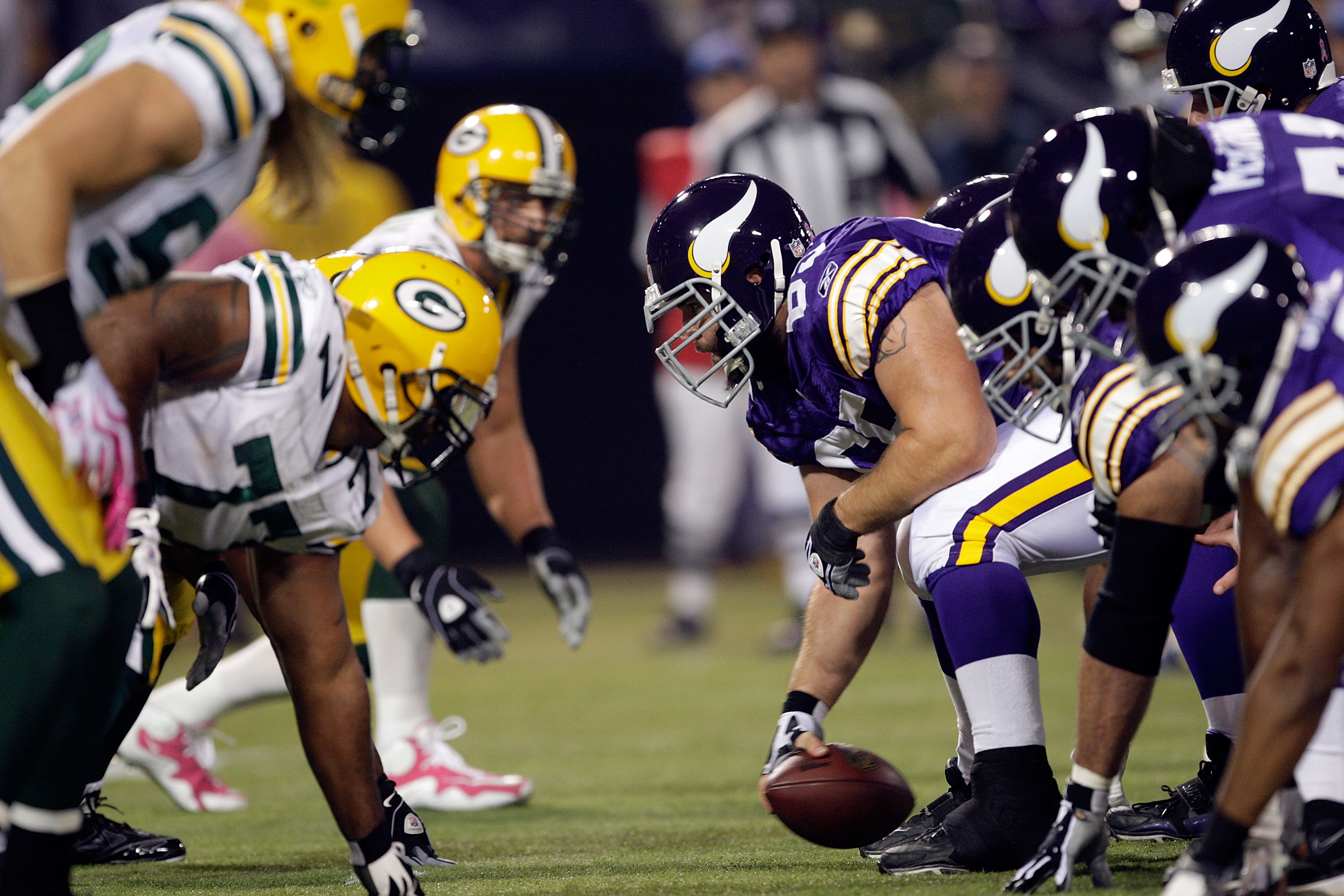 MINNEAPOLIS - OCTOBER 05:  Center John Sullivan #65 and the Minnesota Vikings line up during the game against the Green Bay Packers on October 5, 2009 at Hubert H. Humphrey Metrodome in Minneapolis, Minnesota.  (Photo by Jamie Squire/Getty Images)