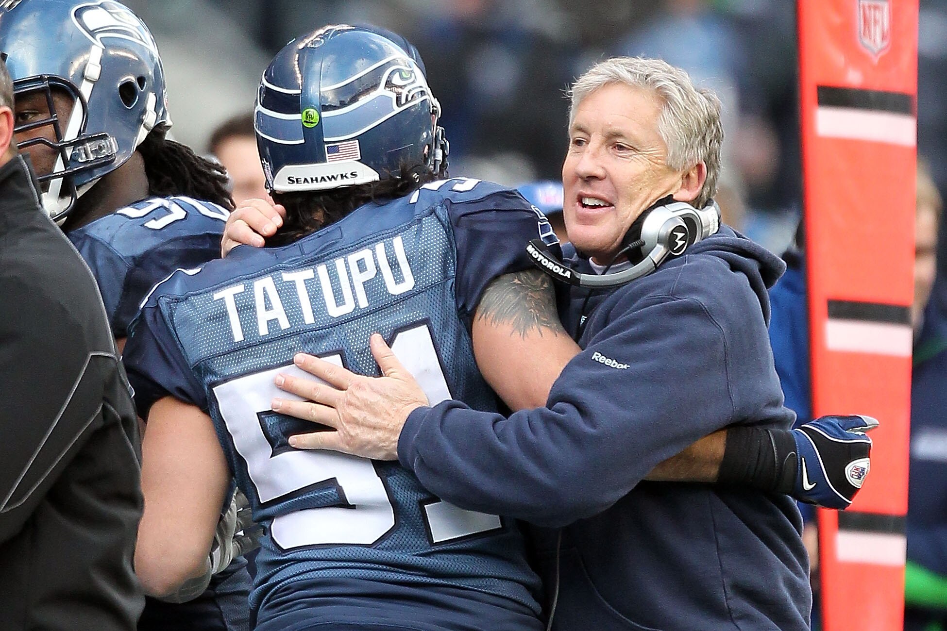 SEATTLE, WA - JANUARY 08:  Head coach Pete Carroll of the Seattle Seahawks reacts in the second quarter with Lofa Tatupu #51 against the New Orleans Saints during the 2011 NFC wild-card playoff game at Qwest Field on January 8, 2011 in Seattle, Washington