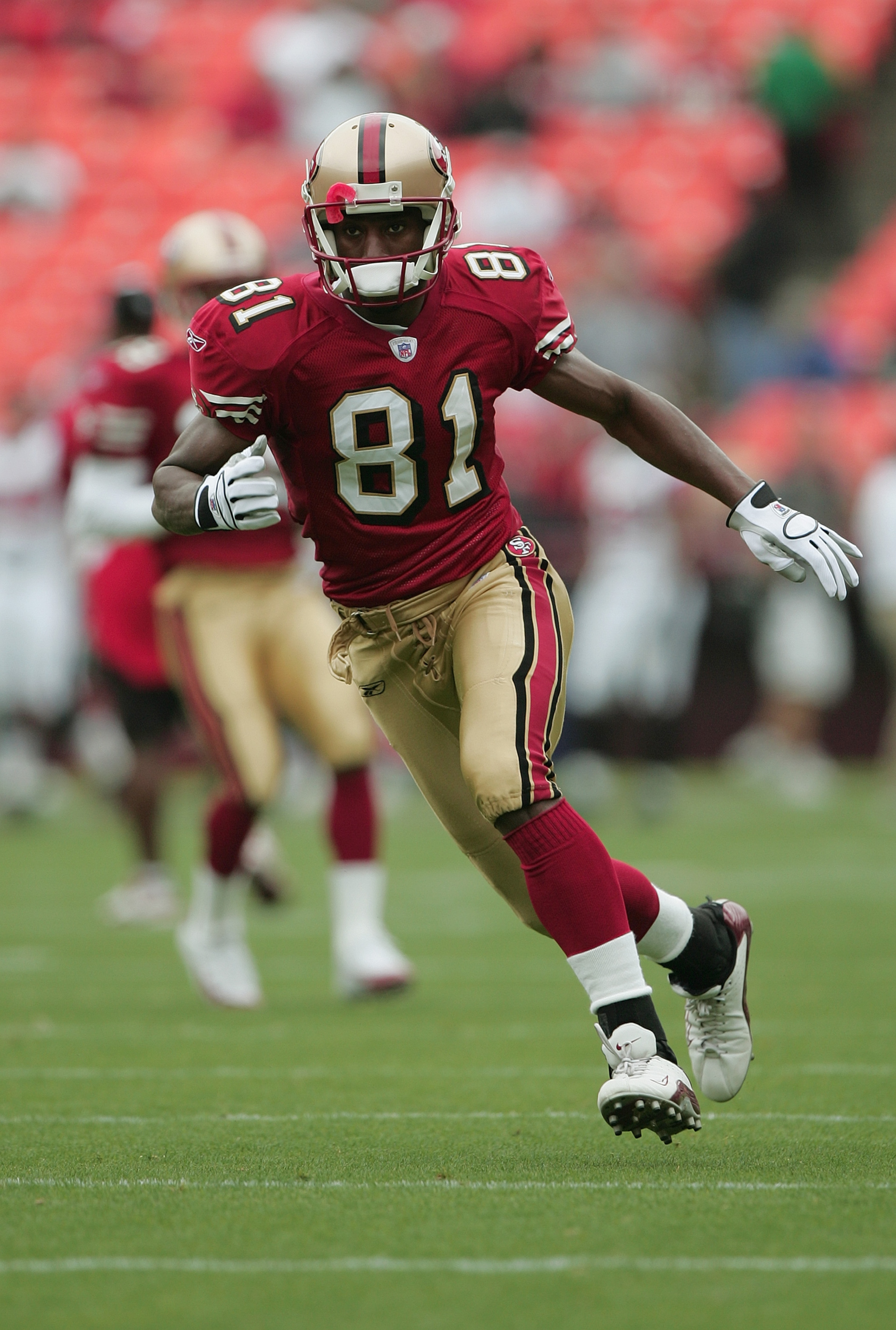 SAN FRANCISCO - SEPTEMBER 12: Wide receiver Rashaun Woods #81 of the San Francisco 49ers carries the ball against the Atlanta Falcons during the game at 3Com Park on September 12, 2004 in San Francisco, California. The Falcons won 21-19. (Photo by Jed J SAN FRANCISCO - SEPTEMBER 12: Wide receiver Rashaun Woods #81 of the San Francisco 49ers carries the ball against the Atlanta Falcons during the game at 3Com Park on September 12, 2004 in San Francisco, California. The Falcons won 21-19. (Photo by Jed J