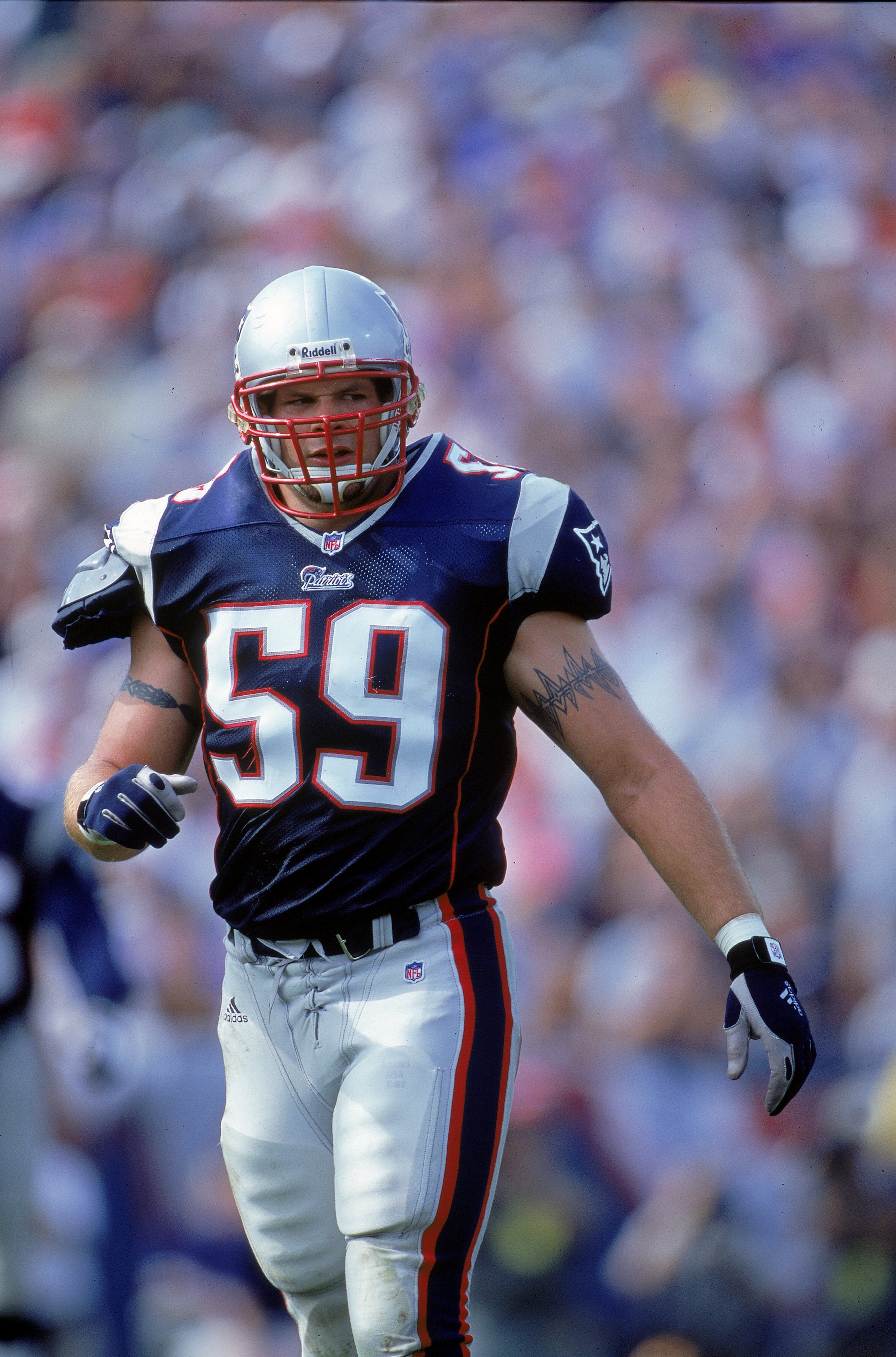 3 Sep 2000: Andy Katzenmoyer #59 of the New England Patriots walks on the field during the game against the Tampa Bay Buccaneers at the Foxboro Stadium in Foxboro, Massachusetts. The Buccaneers defeated the Patriots 21-16.Mandatory Credit: Jamie Squire  /