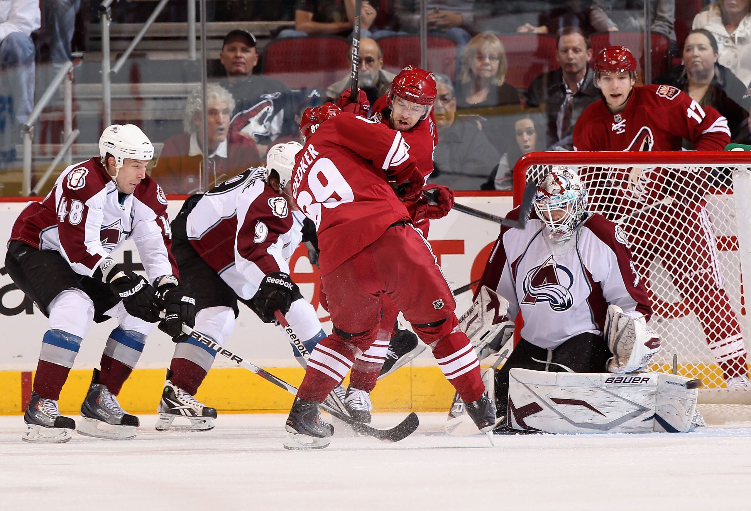 GLENDALE, AZ - APRIL 01:  Mikkel Boedker #89 of the Phoenix Coyotes shoots the puck on goaltender Peter Budaj #31 of the Colorado Avalanche during the NHL game at Jobing.com Arena on April 1, 2011 in Glendale, Arizona.  The Avalanche defeated the Coyotes