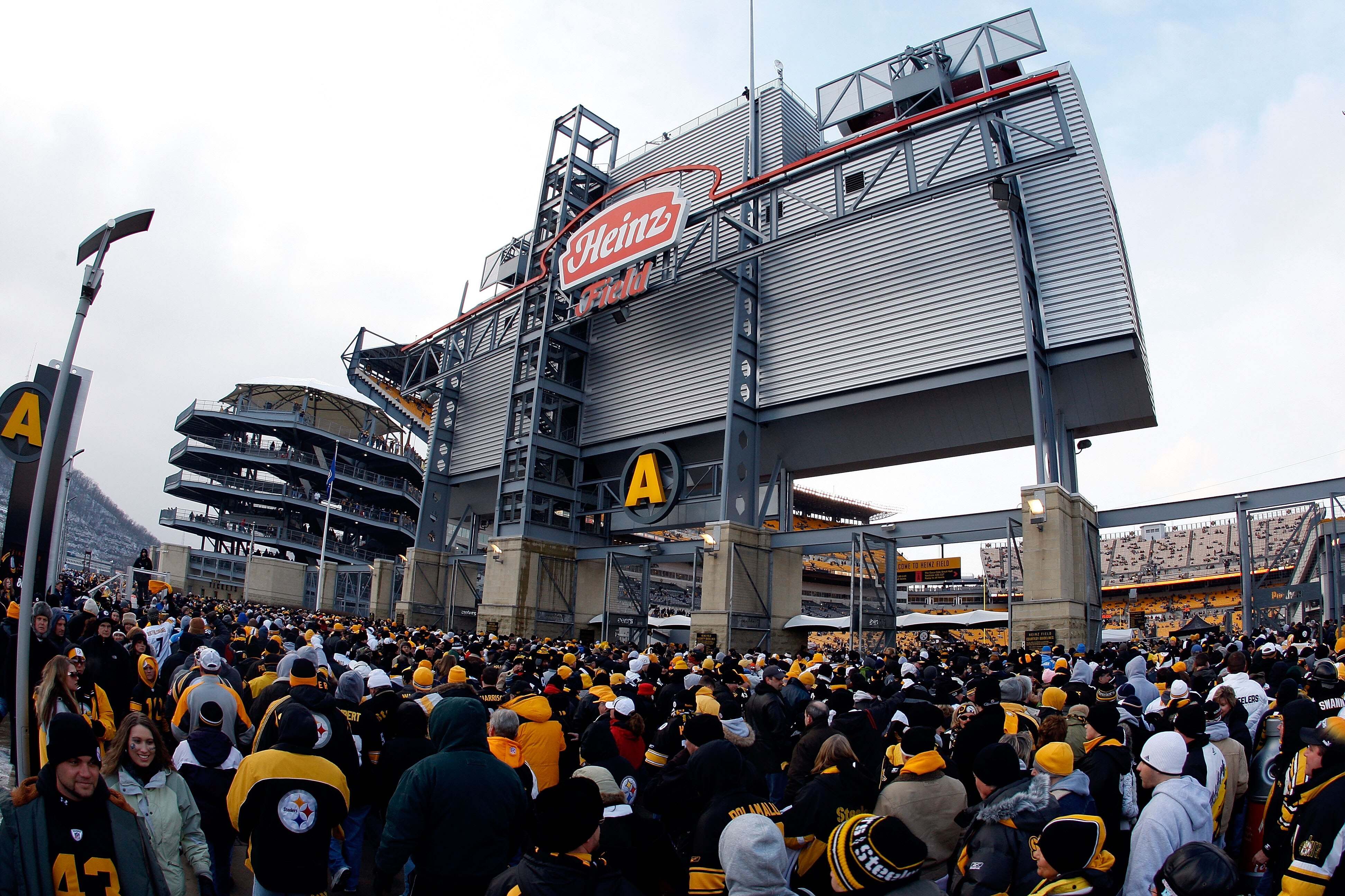 PITTSBURGH - JANUARY 11:  Fans line up outside of Heinz Field as they wait to enter the stadium for the AFC Divisional Playoff Game between the Pittsburgh Steelers and the San Diego Chargers  on January 11, 2009 at Heinz Field in Pittsburgh, Pennsylvania.
