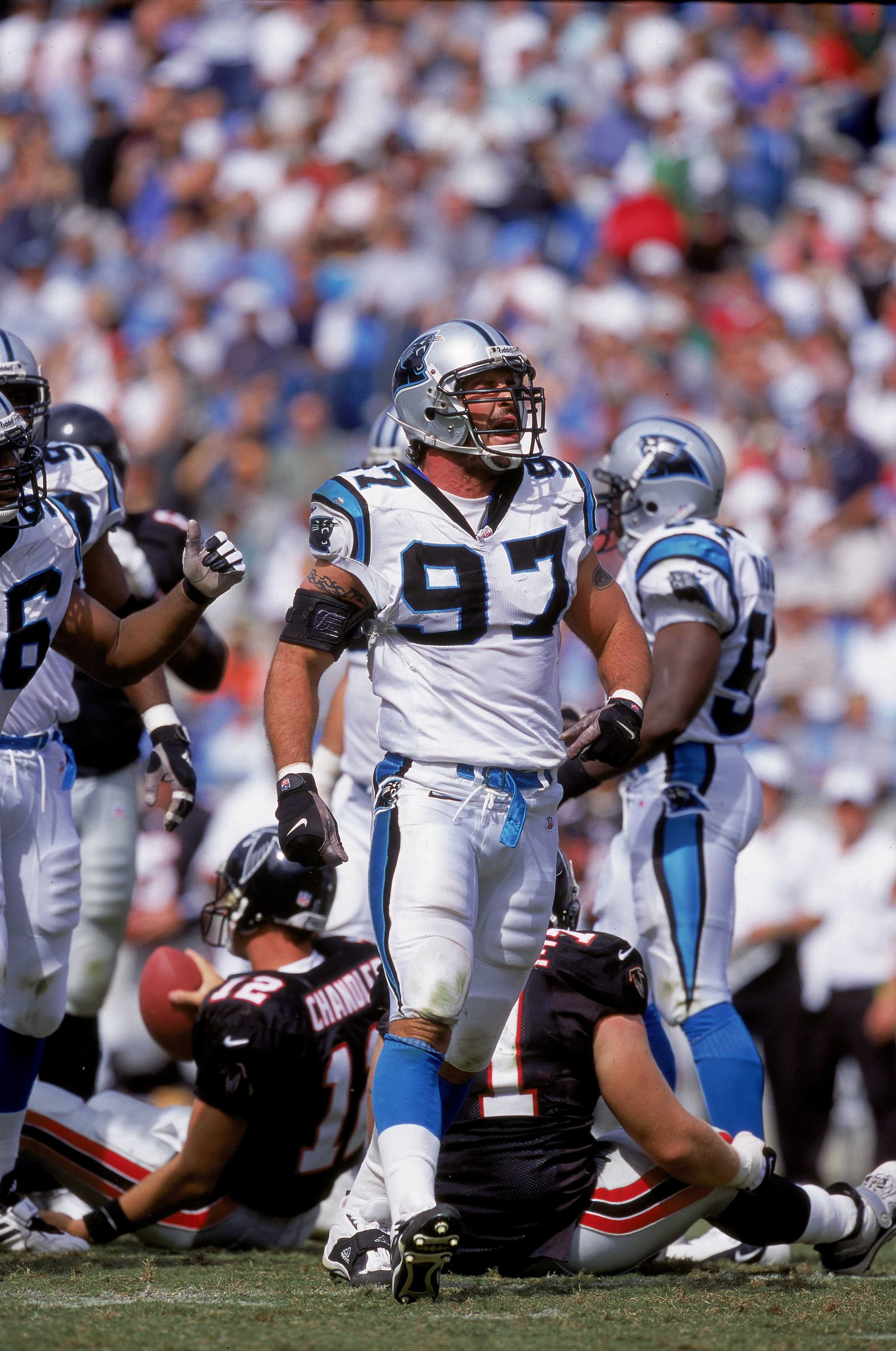 17 Sep 2000: Jason Peter #97 of the Carolina Panthers walks on the field during a game against the Atlanta Falcons at Ericsson Stadium in Charlotte, North Carolina. The Falcons defeated the Panthers 15-10.Mandatory Credit: Craig Jones /Allsport 17 Sep 2000: Jason Peter #97 of the Carolina Panthers walks on the field during a game against the Atlanta Falcons at Ericsson Stadium in Charlotte, North Carolina. The Falcons defeated the Panthers 15-10.Mandatory Credit: Craig Jones /Allsport