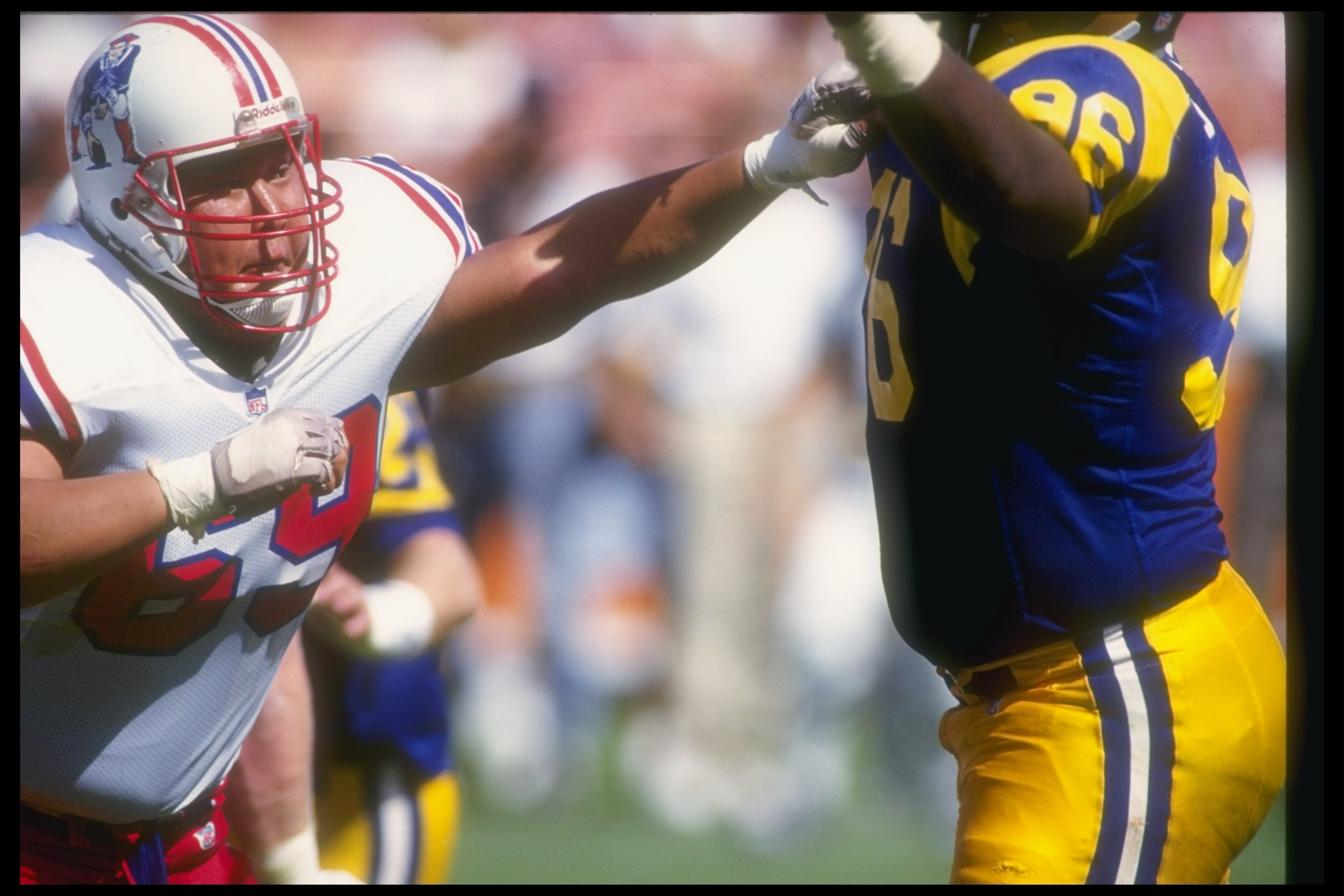 13 Sep 1992: Offensive lineman Eugene Chung of the New England Patriots (left) blocks a Los Angeles Rams player during a game at Anaheim Stadium in Anaheim, California. The Rams won the game, 14-0. Mandatory Credit: Gary Newkirk /Allsport 13 Sep 1992: Offensive lineman Eugene Chung of the New England Patriots (left) blocks a Los Angeles Rams player during a game at Anaheim Stadium in Anaheim, California. The Rams won the game, 14-0. Mandatory Credit: Gary Newkirk /Allsport