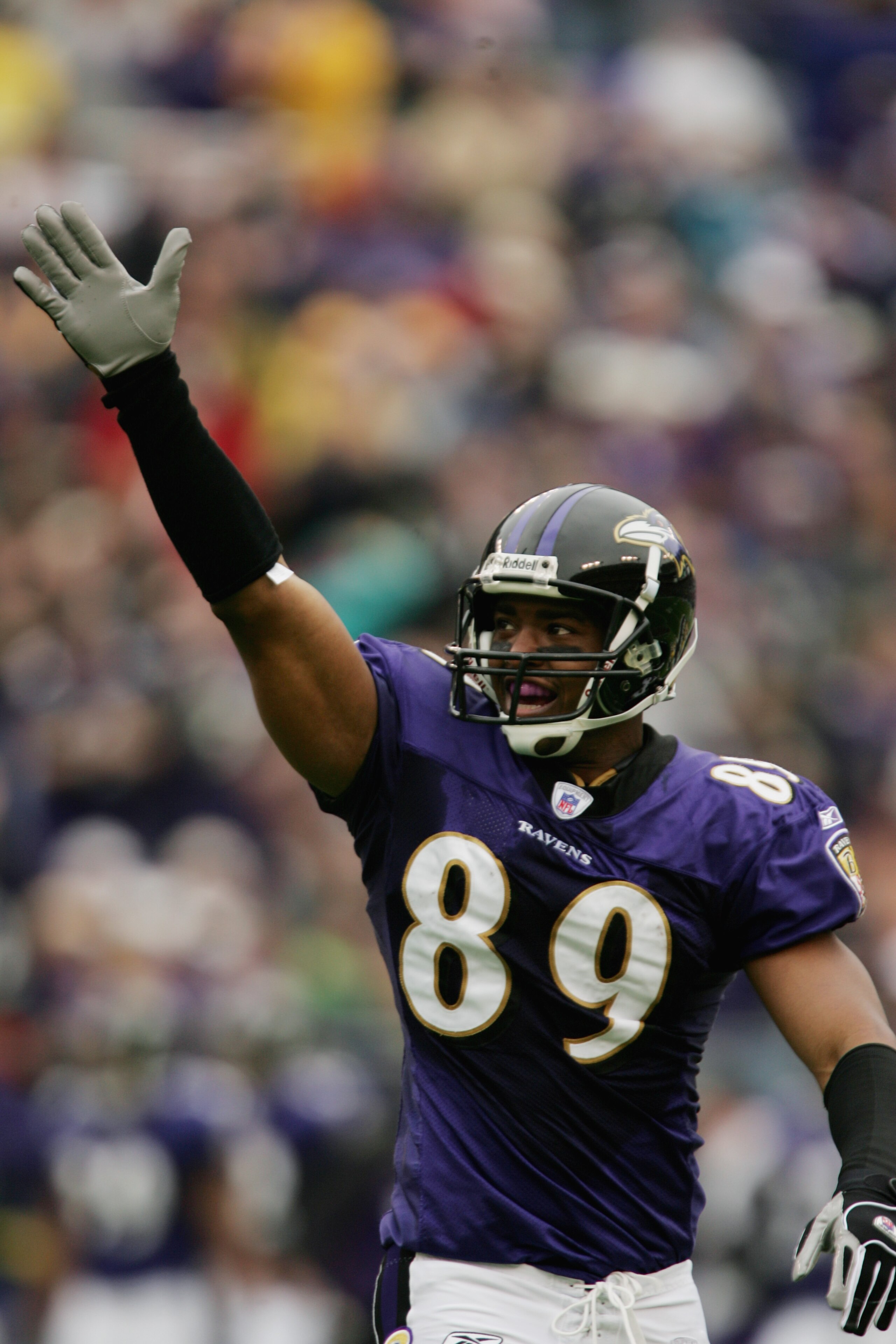 BALTIMORE - OCTOBER 24:  Travis Taylor #89 of the Balitmore Ravens waves to the fans during the game against the Buffalo Bills at M&T Bank Stadium on October 24, 2004 in Baltimore, Maryland. The Ravens defeated the Bills 20-6. (Photo by Doug Pensinger/Get