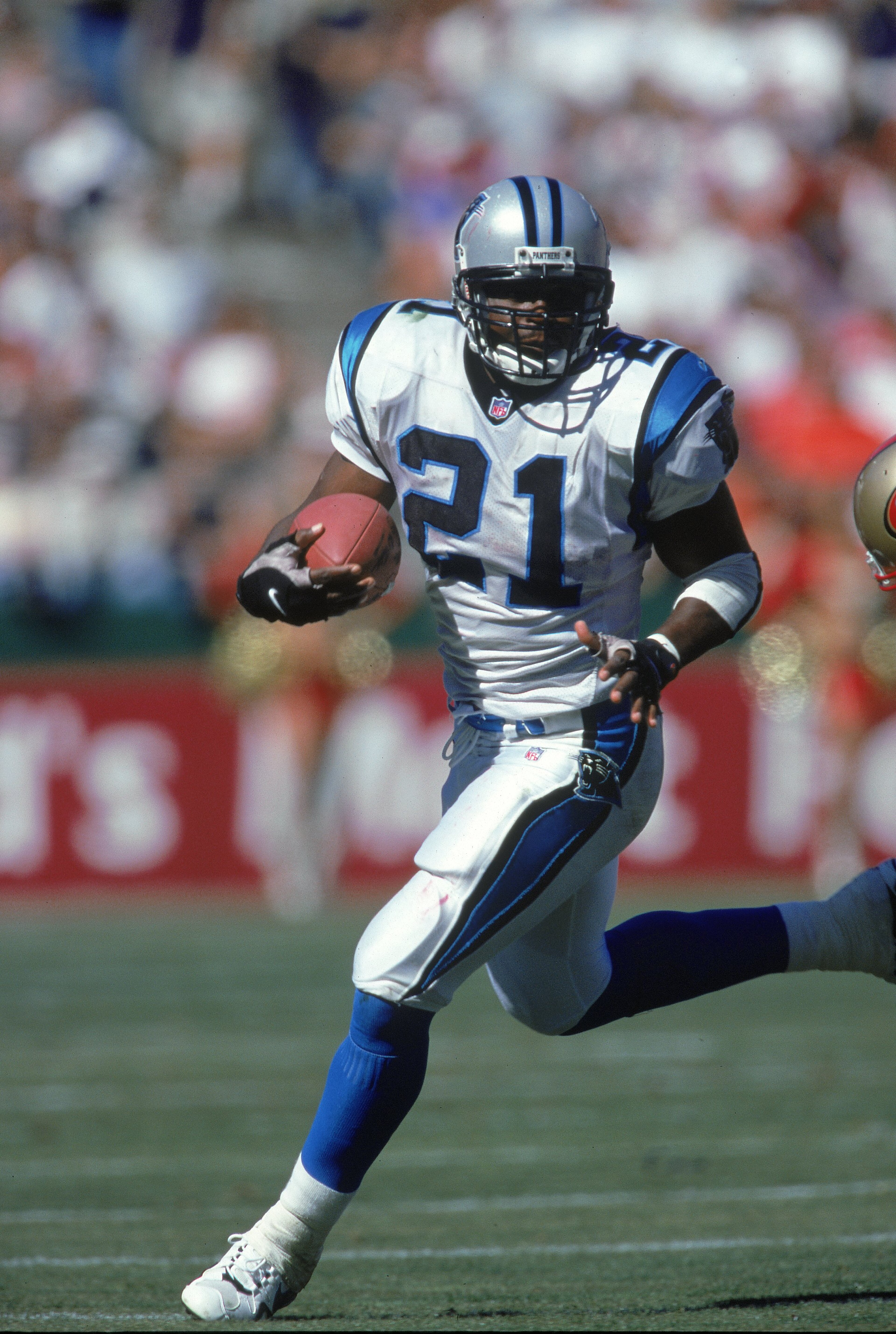 10 Sep 2000: Tim Biakabutuka #21 of the Carolina Panthers carries the ball during a game agaisnt the San Francisco 49ers at 3Com Park in San Francisco, California. The Panthers defeated the 49ers 38-22.Mandatory Credit: Tom Hauck /Allsport 10 Sep 2000: Tim Biakabutuka #21 of the Carolina Panthers carries the ball during a game agaisnt the San Francisco 49ers at 3Com Park in San Francisco, California. The Panthers defeated the 49ers 38-22.Mandatory Credit: Tom Hauck /Allsport